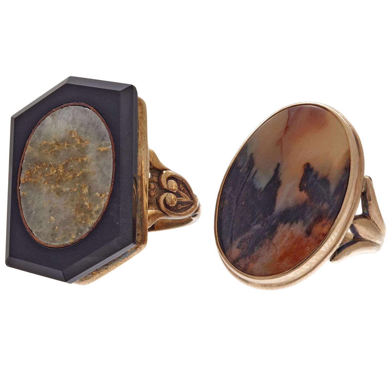 Collection of Two Gold-in-Quartz, Agate Rings: Including one Art Deco ring centering an oval gold-in-quartz tablet framed in black onyx, set in a vermeil mounting, size 5 1/4; together with one ring featuring an oval agate tablet set in a 10k rose