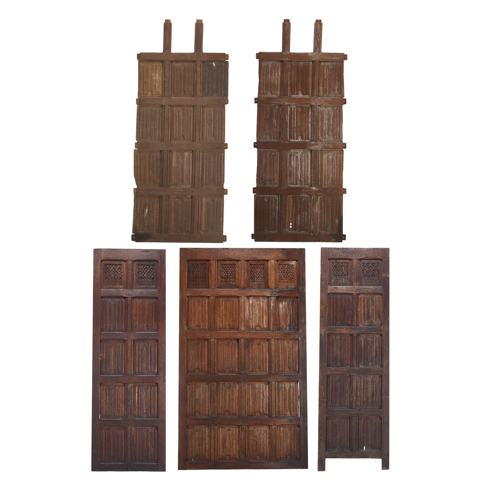 Spanish Gothic Carved Oak Panels: Northern Spain. 15th/16th Century. Five panels, each carved with linen fold design, the two tallest carved with Quatrefoil and tracery. By repute, from a monastery or abbey in Northern Spain, very pos