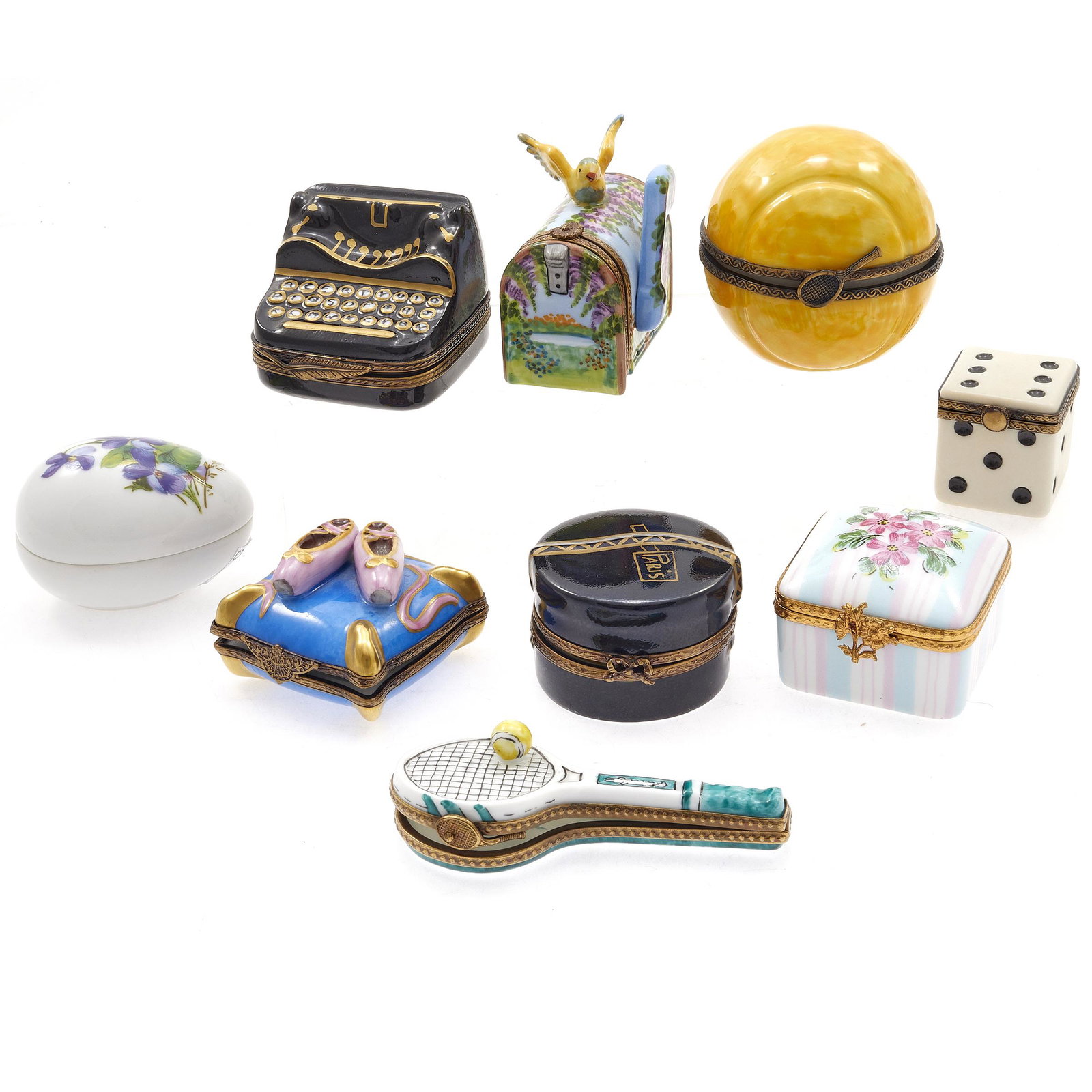 Collection of Limoges Boxes: Including a typewriter, Tennis ball, Mailbox and Die. Greatest height 2 1/2in. (6cm)