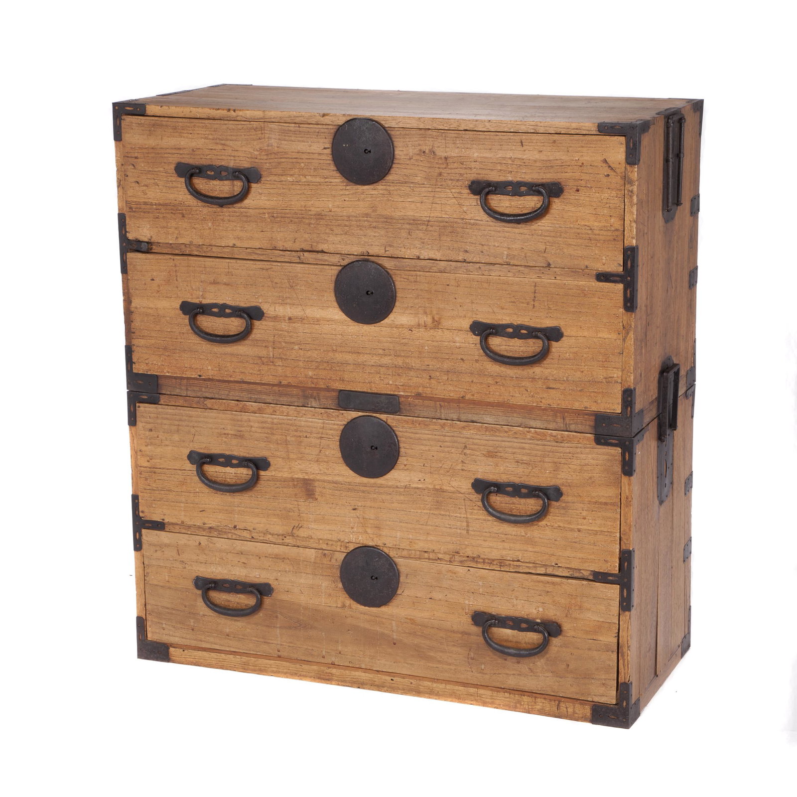 Wardrobe Tansu, Meiji Period: The two-piece cabinet featuring four drawers with cast iron mountings. 38 1/2 x 35 5/8 x 15 1/8 inches Condition: Overall wear.