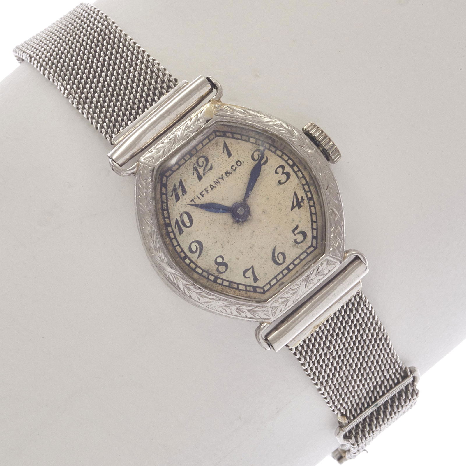 Ladies Tiffany & Co. Art Deco Platinum Wristwatch: DIAL: Barrel, silvered, black Roman numeral hour markers, black outer minutes track, blued dauphine hands, Tiffany & Co. MOVEMENT: Mechanical, eighteen (18) jewels, 3 adjustments, Cresarrow Watch Co.,