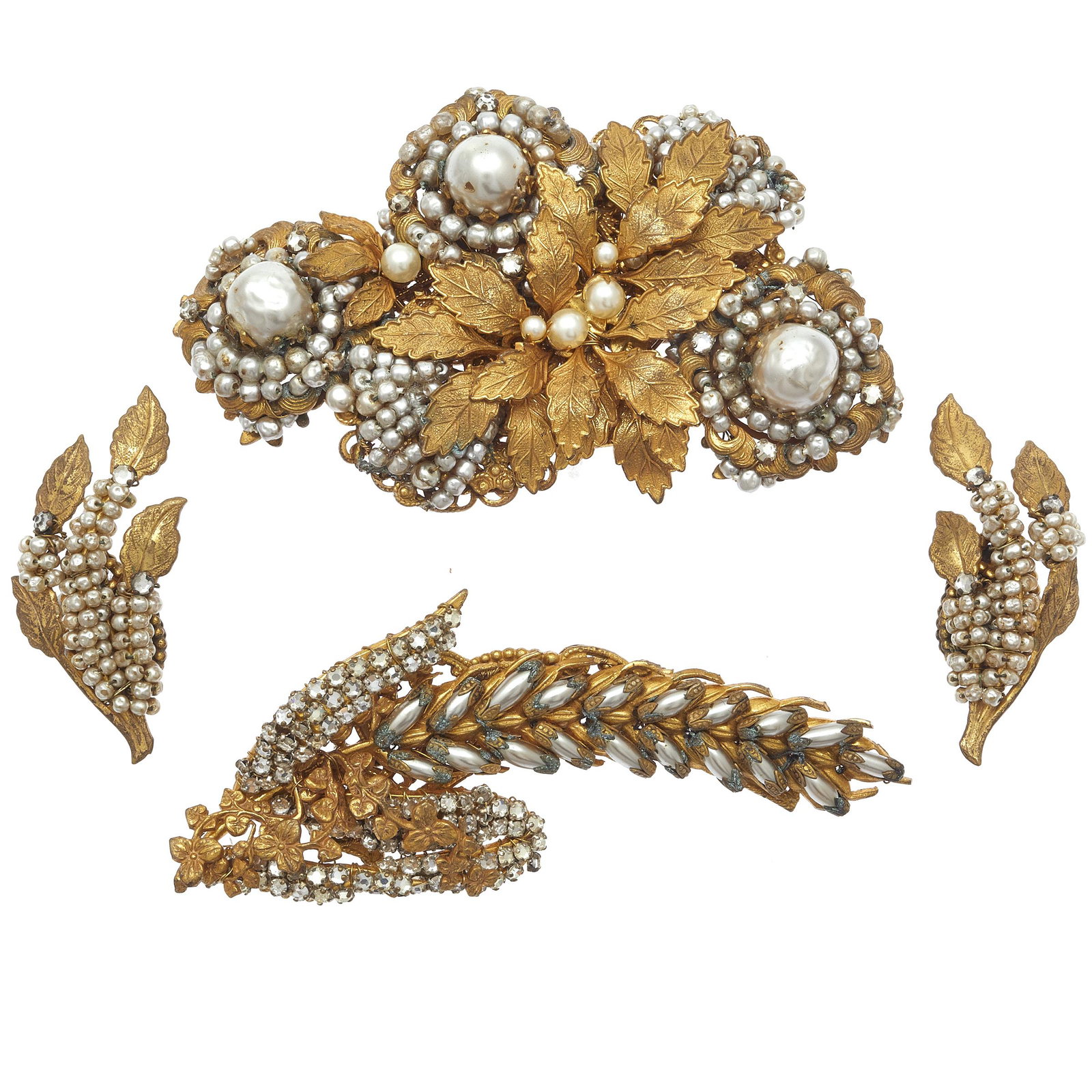 Collection of Miriam Haskell Jewelry: Including one floral brooch composed of numerous faux pearls and rhinestones; one pair of faux pearl and rhinestone ear clips; together with one wheat-form brooch composed of faux pearls and rhineston