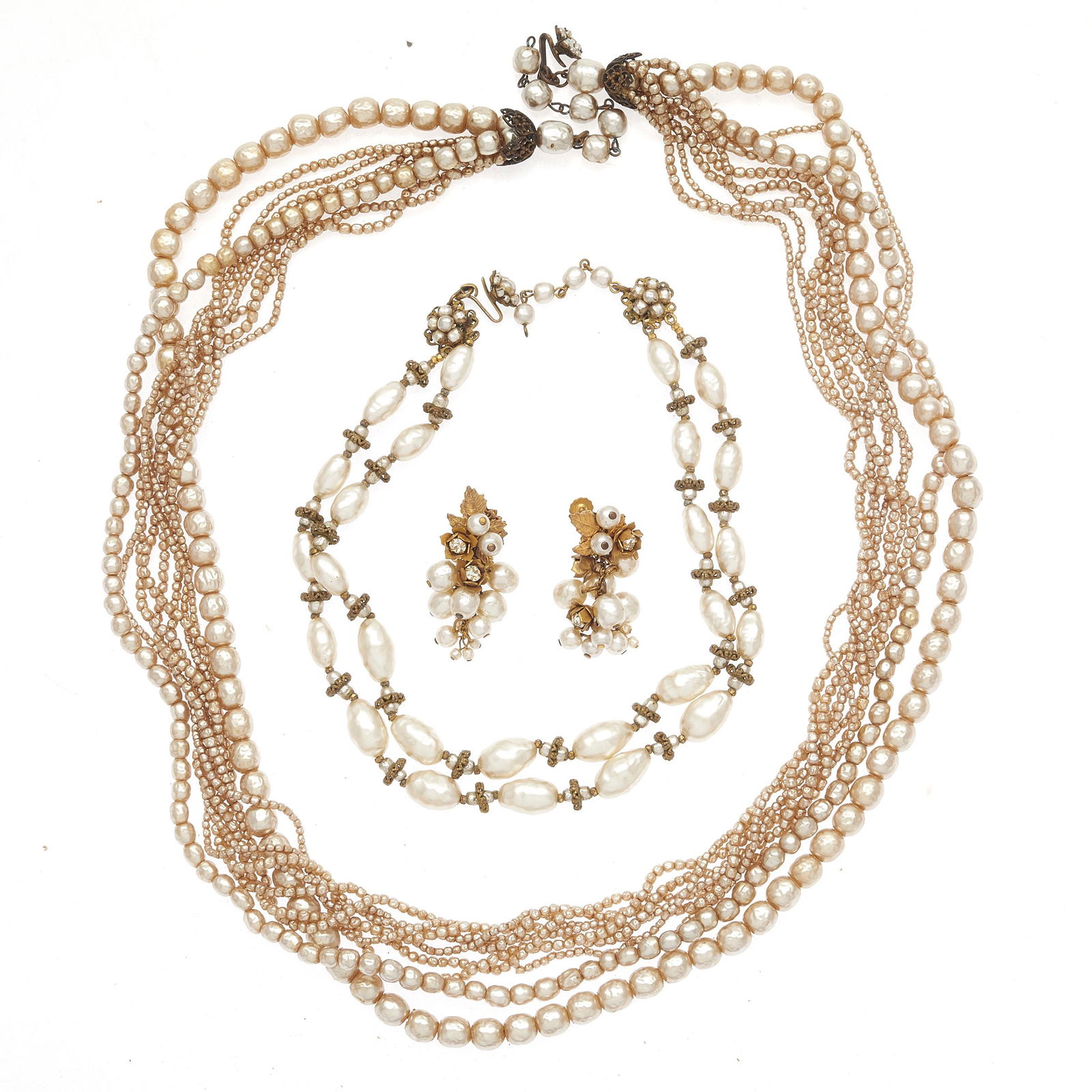 Collection of Miriam Haskell Faux Pearl Jewelry: Including one nine-strand faux pearl necklace, 27 inches with extender; one double strand faux baroque pearl necklace, 14 inches with extender; together with a pair of faux pearl, rhinestone ear clips