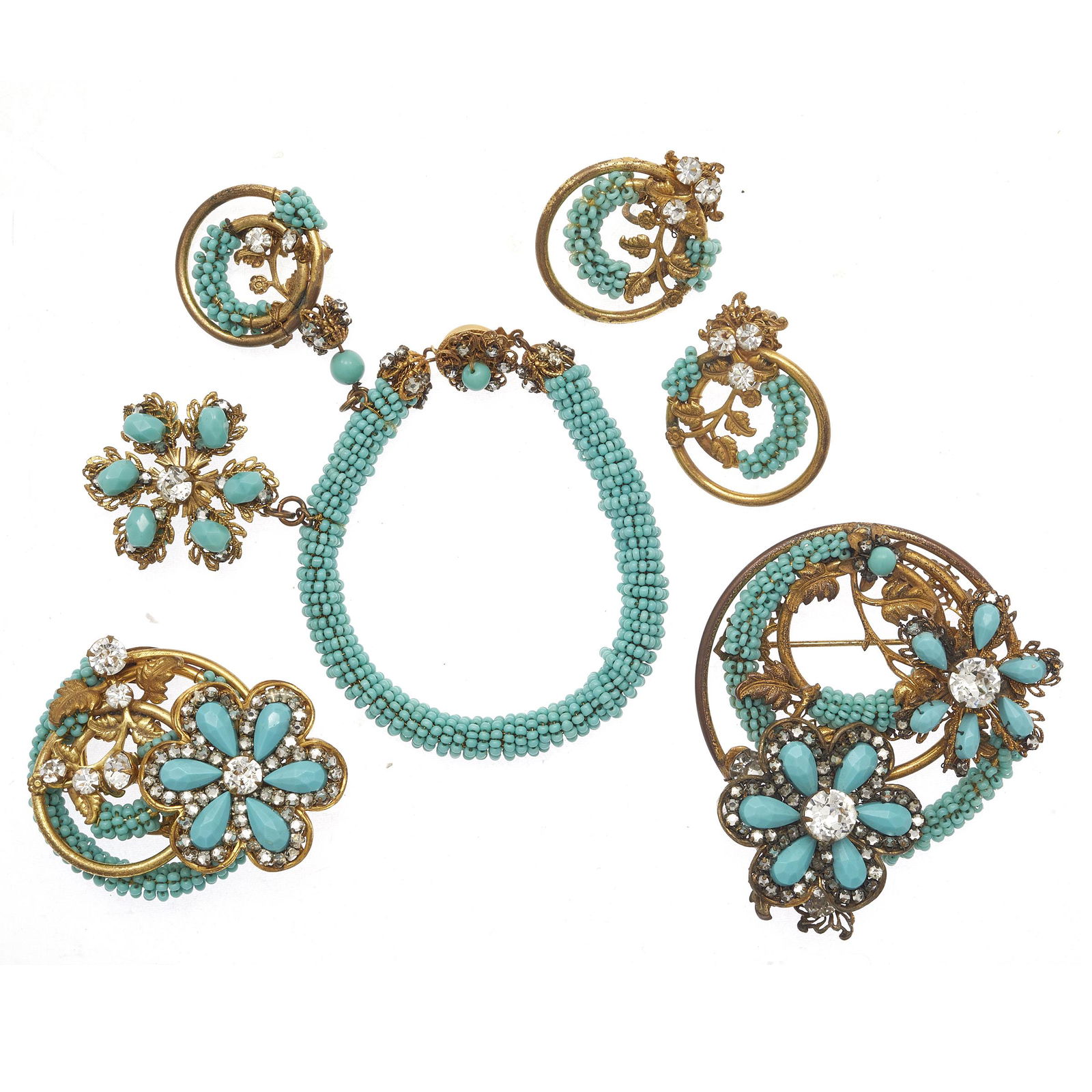 Collection of Vintage Miriam Haskell Beaded Jewelry: Including one beaded bracelet with two charms, a pair of matching earrings, together with two matching brooches. All signed. #costumejewlery A portion of the proceeds to benefit the SF-Marin Food Bank