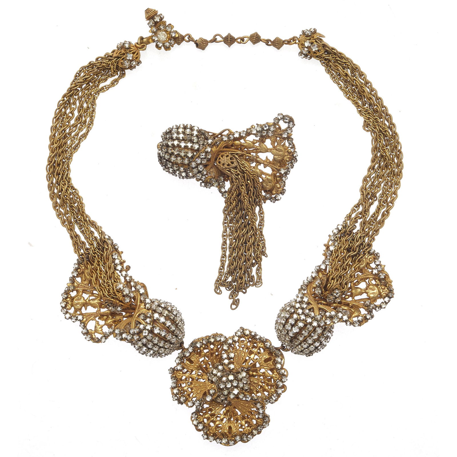 Miriam Haskell Rhinestone, Gold-Tone Necklace and: Comprised of six strands of gold-tone chain joined to a center panel of flowers accented with rhinestones forming a 14 inch necklace with 2 1/2 inch chain extender, together with a matching brooch. Si