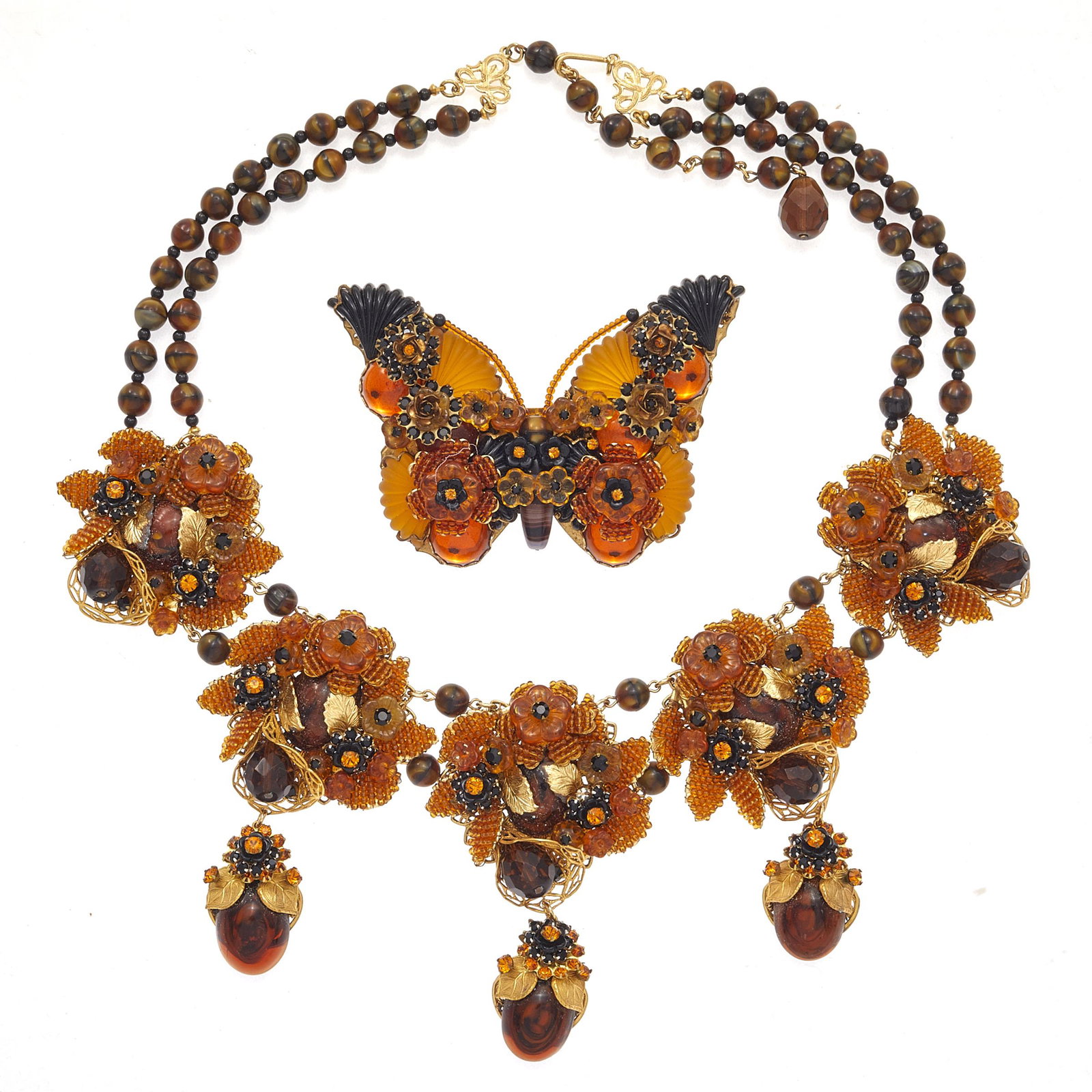Stanley Hagler Beaded Necklace and Butterfly Brooch: Including one amber color floral necklace, 18 inches with 4 inch extender, together with a matching butterfly brooch measuring approximately 94.8 x 70.9 mm. Necklace signed "Stanley Hager N.Y.C," broo