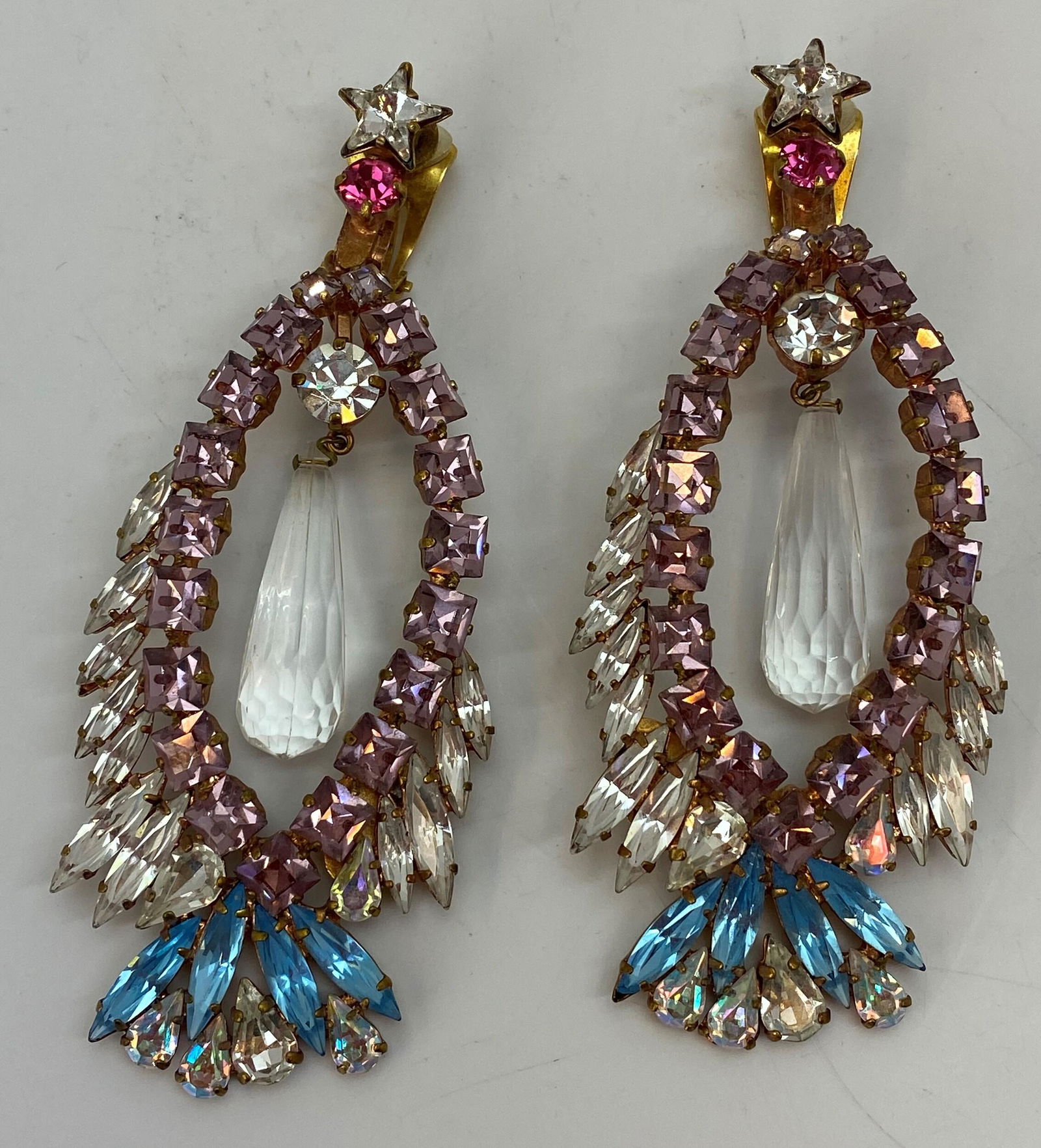 Yves Saint Laurent Rive Gauche Vintage Ear Clips: Embellished with crystals set on a gold-tone ear clip mounting measuring approximately 97.4 x 40.4 mm. Signed "Yves Saint Laurent, Rive Gauche, Made in France." #costumejewlery
