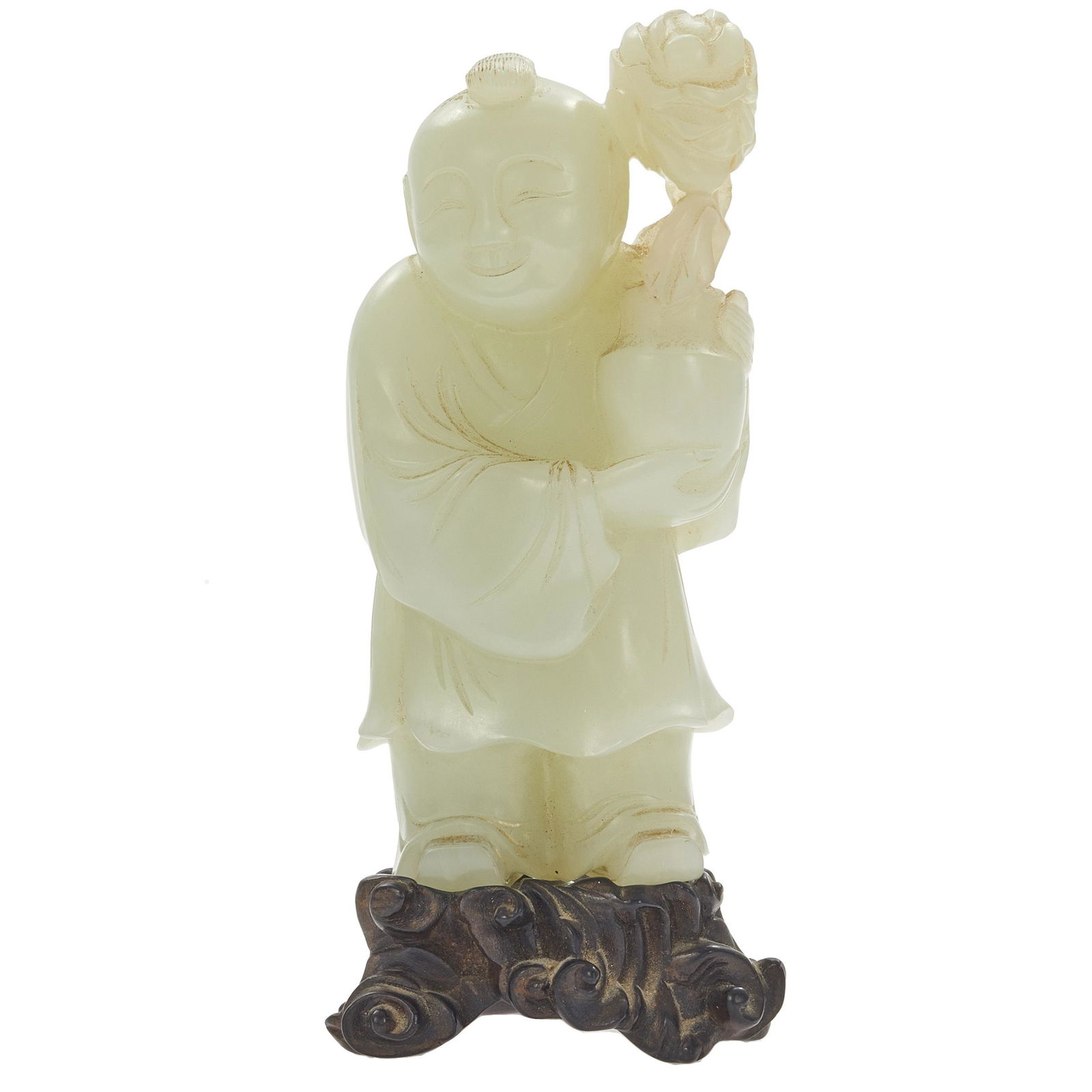 Celadon Jade Figure of a Boy: The standing figure dressed in a robe and trousers supporting a vase issuing leafy flower sprays, and expressing a content smile, fitted wood stand. Height: 3 1/8 inches #Jade