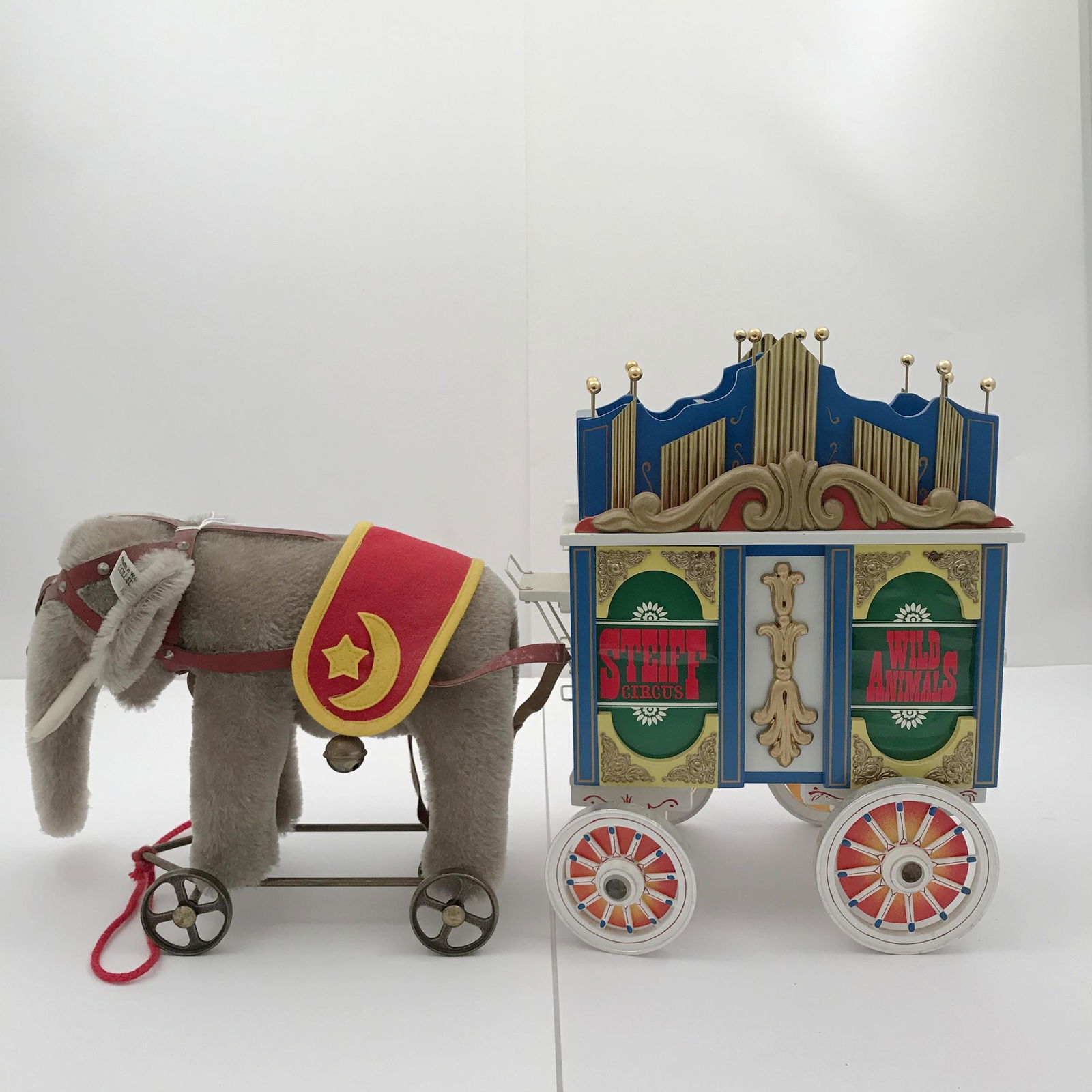 Steiff Golden Age of the Circus Elephant Toy: Steiff Golden Age of the Circus Elephant Toy. There are two boxes with the Elephant and circus carts.