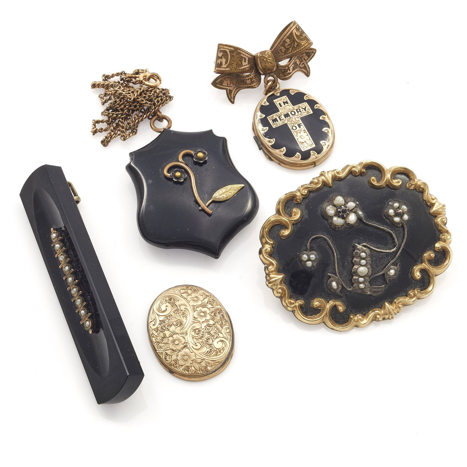 Collection of Victorian Mourning Jewelry: Collection of Victorian Mourning Jewelry Including one bar pin featuring nine seed pearls set in a rectangle-shape onyx plaque measuring approximately 66.7 x 13.5 mm (2.62 x 0.53 in); one pin centerin