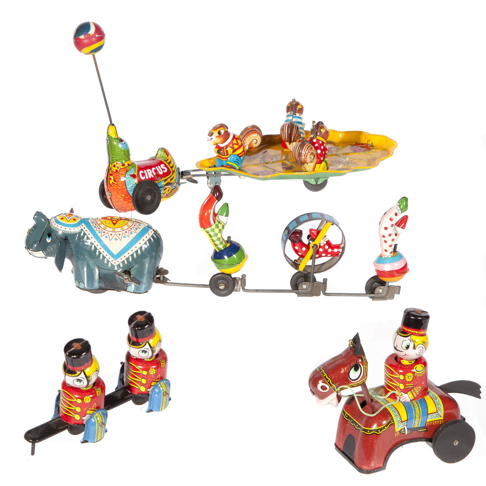 3 Vintage Japan Tin Parade Pull Along Toys: Group of three colorful parade and circus theme pull along toys featuring performers and animals. Elephant T.P.S Japan, Parade of Soldiers Mikuni made in Japan, and 'circus' Duck with rubber ball pull
