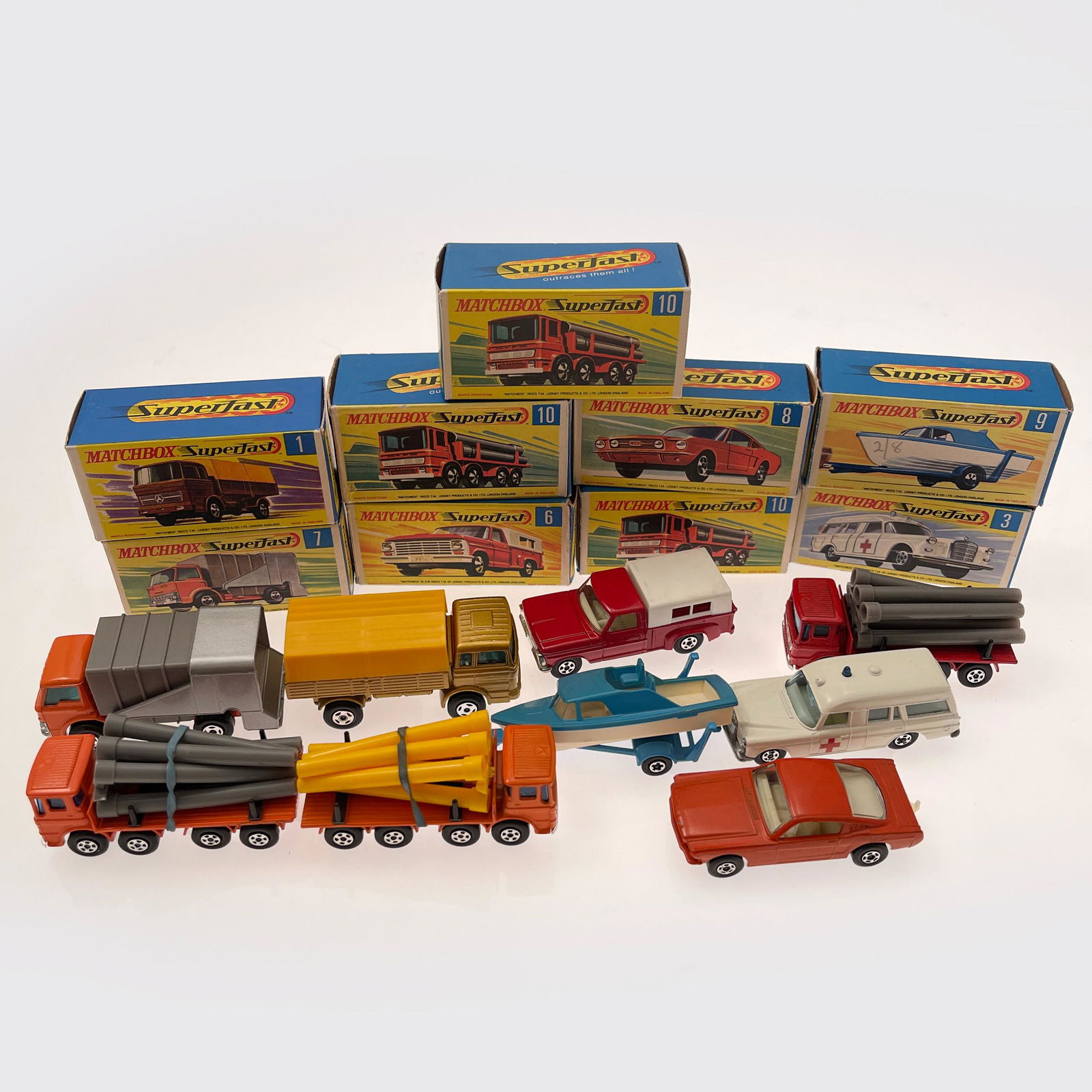 Group Of Nine Boxed Matchbox Superfast Vehicles, Including: 1 Mercedes Truck, gold body, removable (1 of 3)