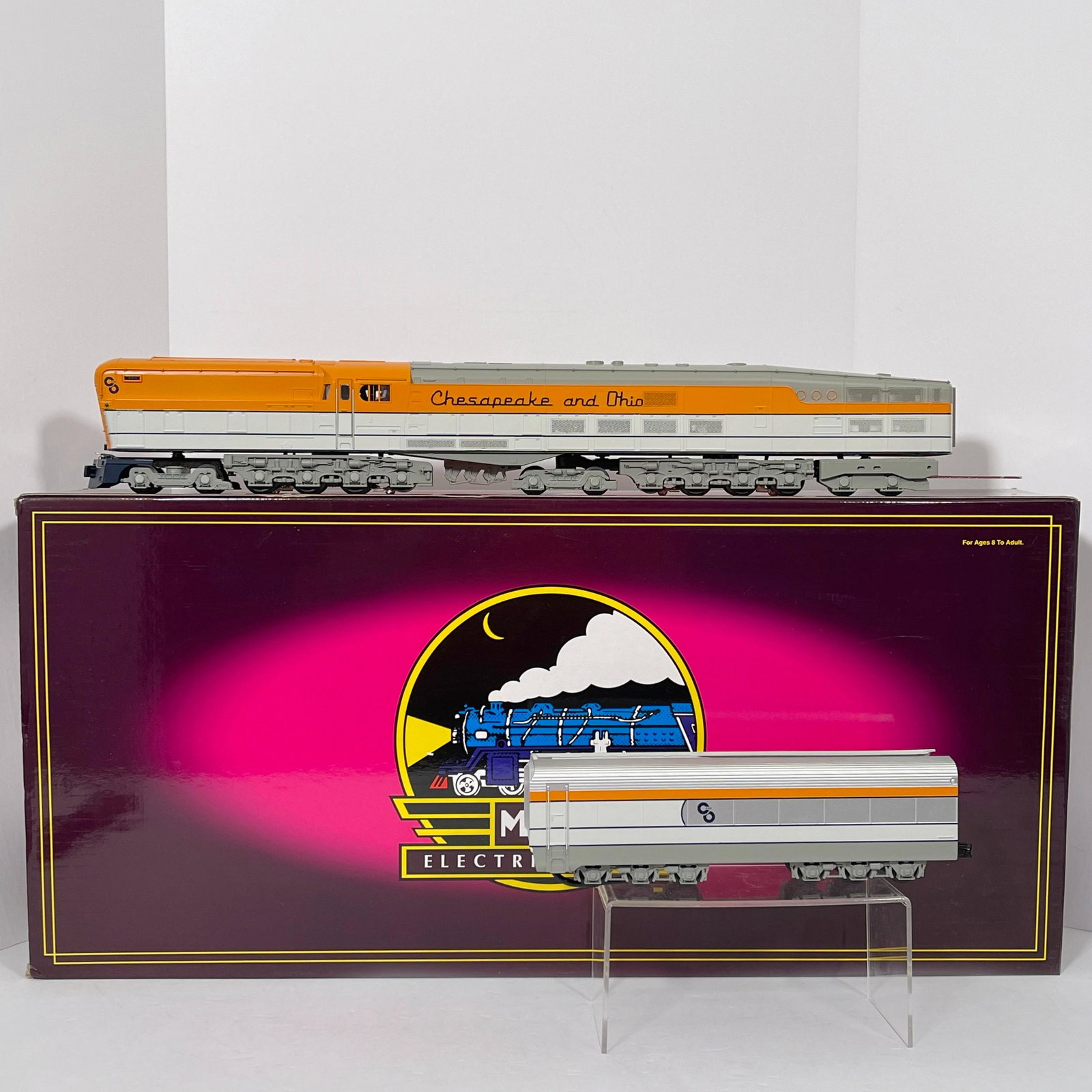 Modern MTH 20-3042-1 O Gauge C&O M-1 Steam Turbine, Three-rail, die cast metal, orange and: Modern MTH 20-3042-1 O Gauge C&O M-1 Steam TurbineThree-rail, die cast metal, orange and silver "Chesapeake & Ohio" livery, with Proto-Sound, with instructions and original sales receipt, in o