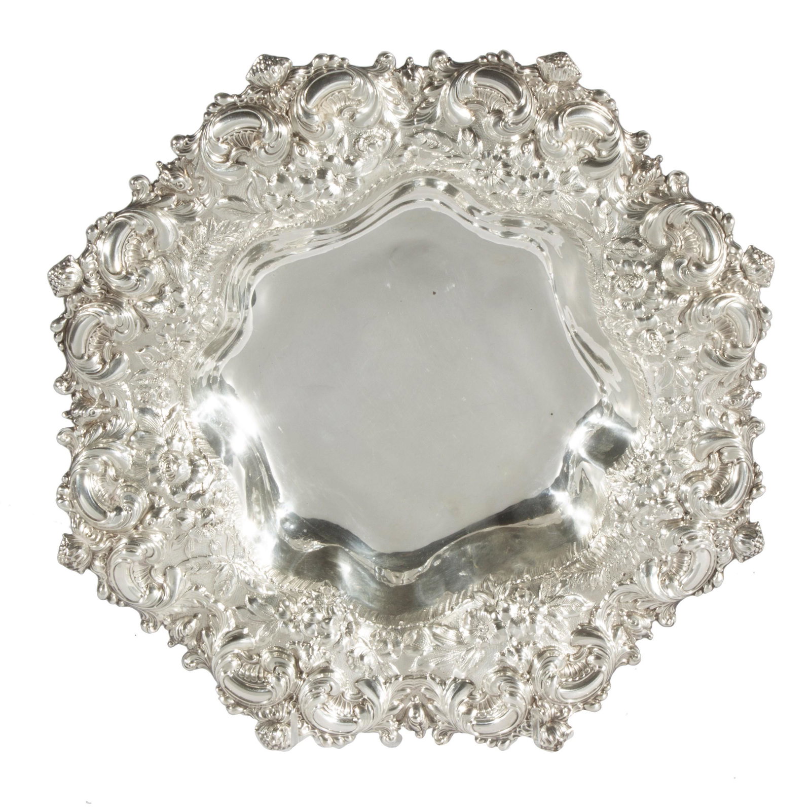 Shreve & Co. Sterling Bowl: The rim repousse with everted scrolls, acanthus and berried finials.2in. (5cm) h. 11 !/2in. (29cm) d.419.8 grams