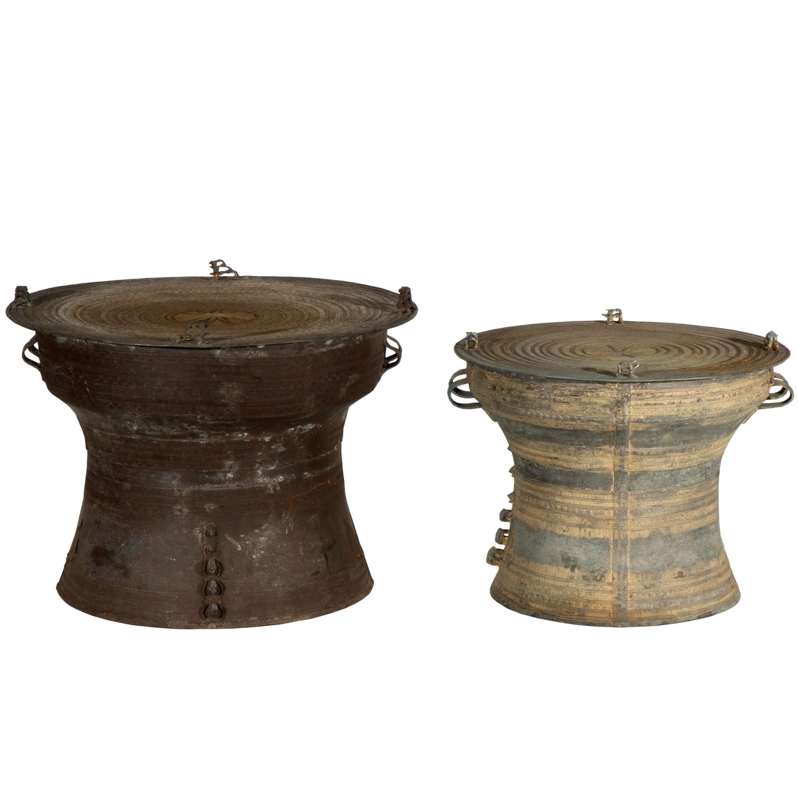 South Asian Bronze Rain Drum: Of tapering form decorated with a central sunburst within concentric circles and elephant parade upon the side.18in. (46cm) h. 24in. (61cm) d