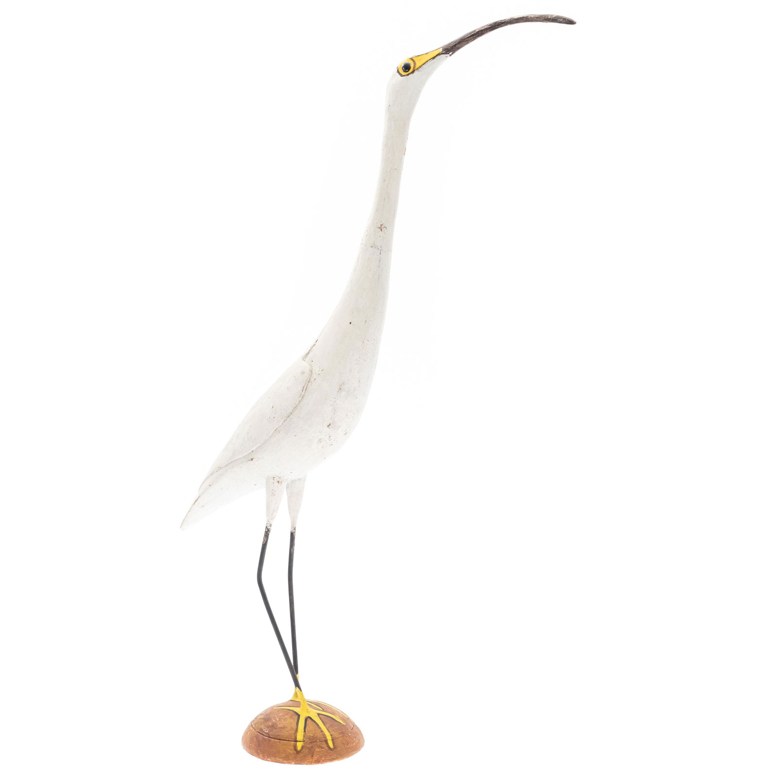 Contemporary Folk Art Shorebird Decoy, Thomas Langan: Carved and painted in the form of a Long Billed Curlew.Applied eyesStanding on a round base26in. (66cm) h.Condition: Slight paint loss to center of neck.