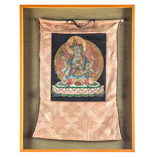 Tibetan Thangka: Tibetan ThangkaSilk, depicting the three faced deity Ushnishavijaya.14in. x 22in. (35cm. x 56cm).Framed: 21in. x 28in. (53cm. x 71cm).