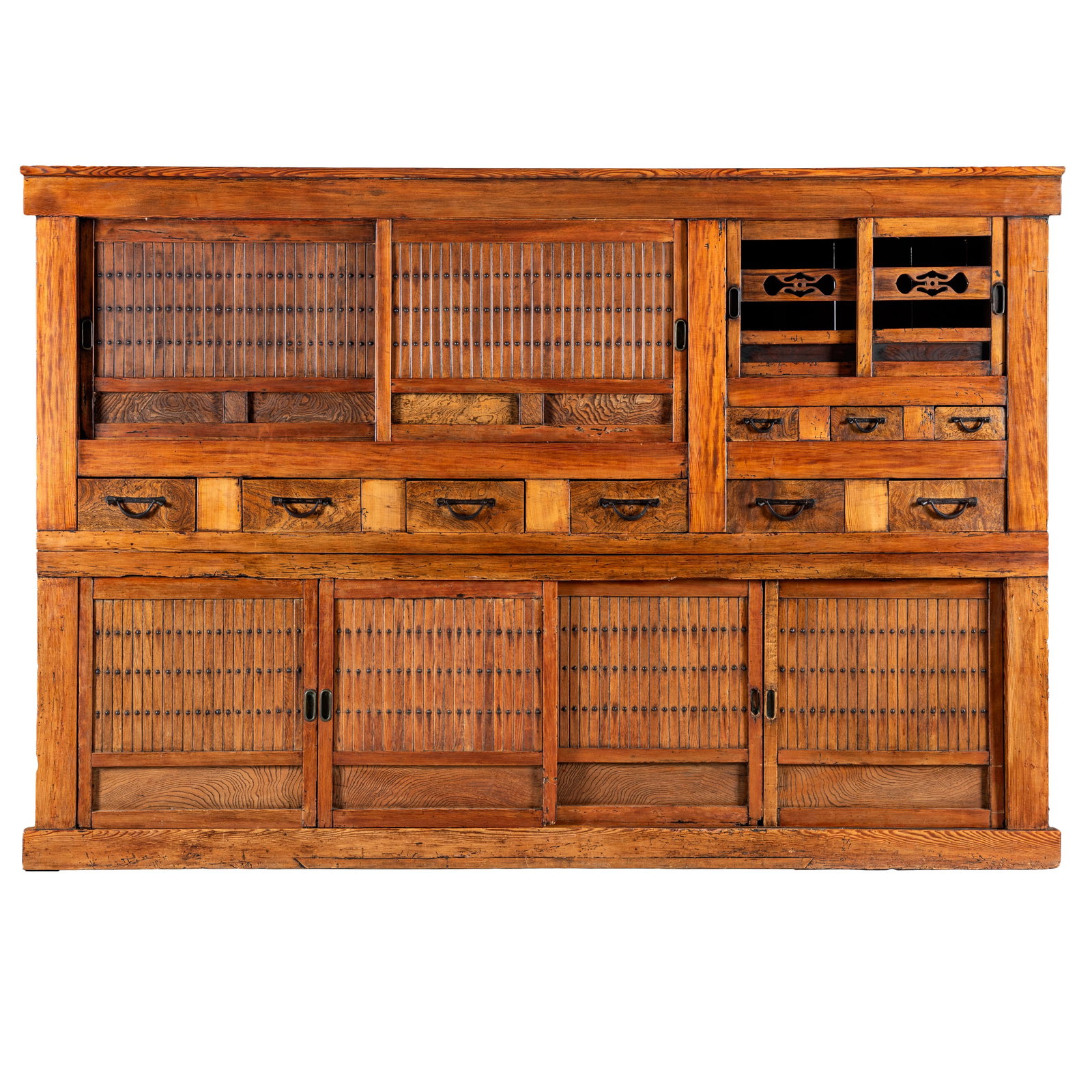 Meiji Kitchen Tansu: Meiji Kitchen Tansu With pierce carved floral rails on open doors and slat doors above drawers and lower slat doors. 68in. (172cm) h. 104in. (264cm) l. 20in. (51cm) d.
