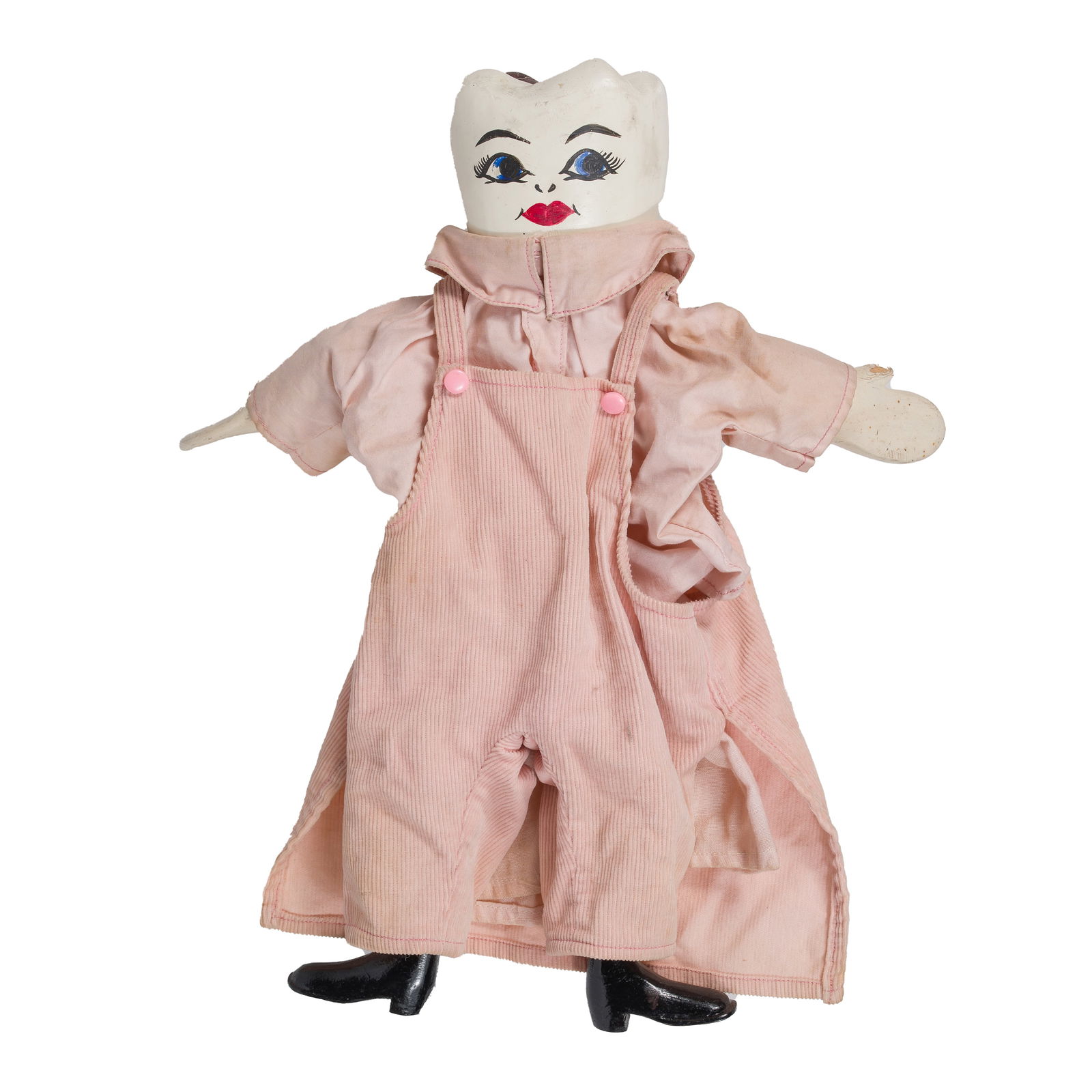 Tooth Doll: Tooth DollComposition doll with a tooth form head. Two sided face, with one happy side due to healthy teeth, and one sad side due to unhealthy teeth. Wooden hands and feet. Fabric body. 12" long.