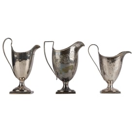 A Collection of Georgian Sterling Cream Pitchers