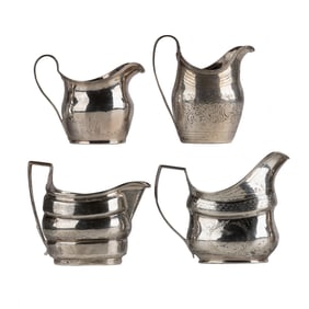 A Collection of Georgian Sterling Cream Pitchers