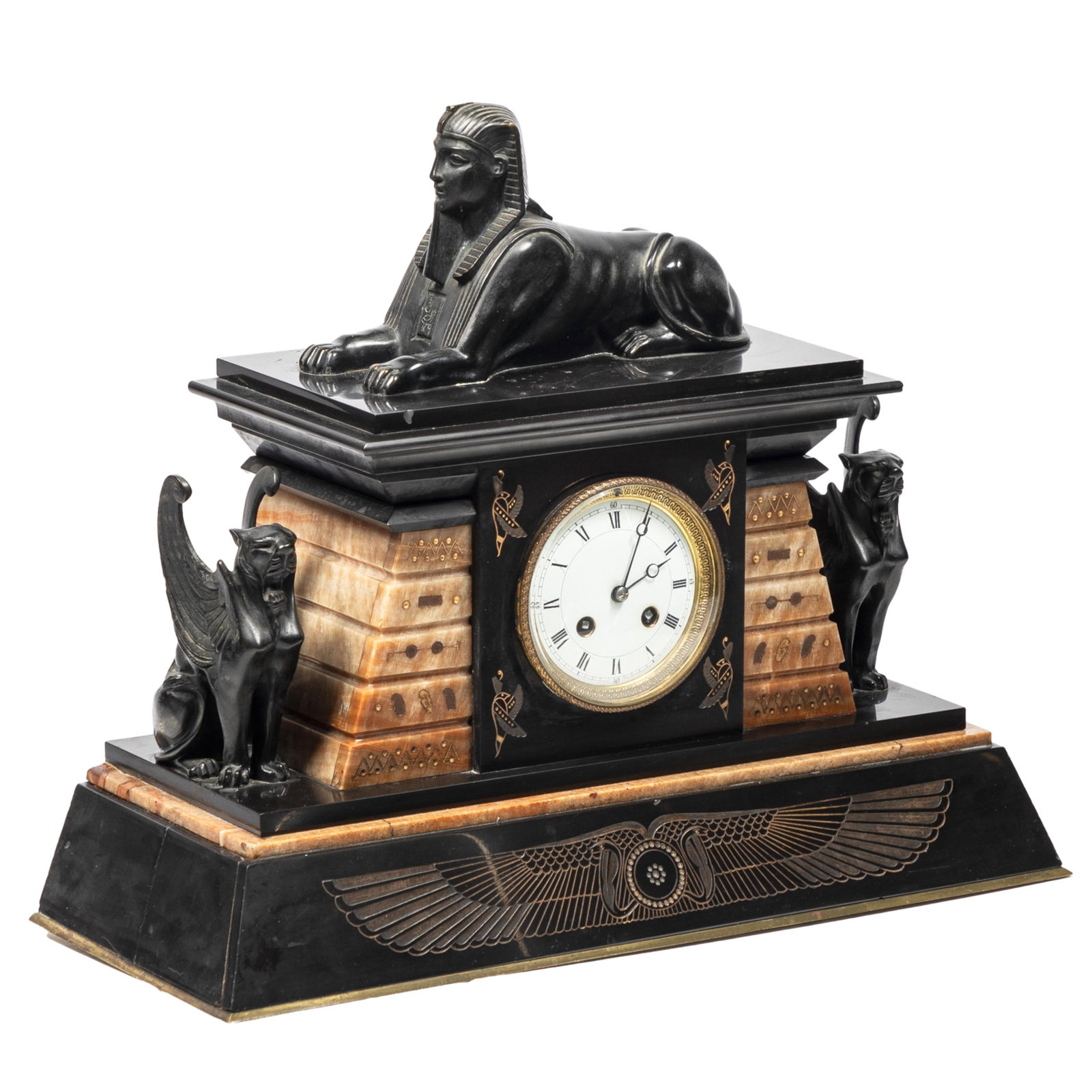 French Retour d ' Egypte Mantel Clock: French Retour d ' Egypte Mantel Clock The dial in a slate and onyx case surmounted by a sphinx and flanked by figures of Bastet. 17in (43cm) h19in (48cm) l. 9in (23cm) d.