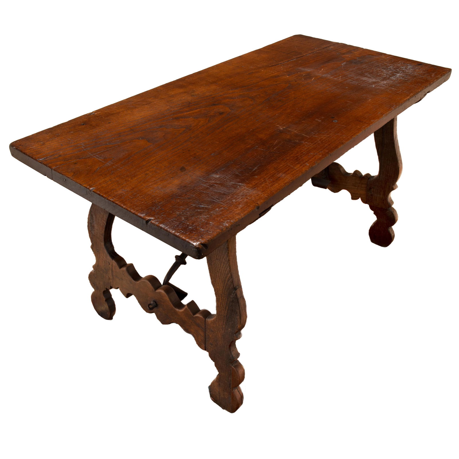 Portuguese Baroque Dining Table: Portuguese Baroque Dining TableThe rectangular top on trestle form supports joined by arched iron stretchersFrom the interior of a home, designed by Michael Taylor30in. (76cm) h. 55in (140cm) l. 27in