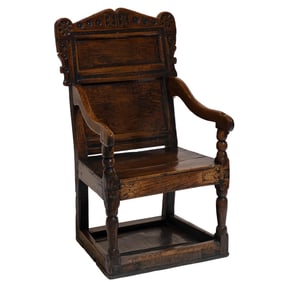 A Jacobean Oak Armchair