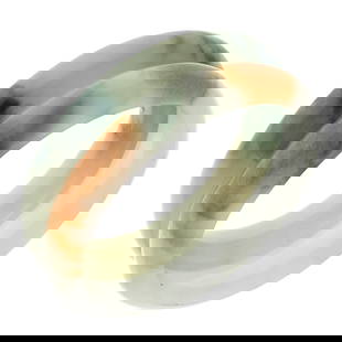 Pair of Jadeite Bangle Bracelets: Pair of Jadeite Bangle BraceletsIncluding one jadeite bangle with green, russet and darker green veining, measuring approximately 11.0 mm in width, inner circumference 5 1/2 inches; together with one