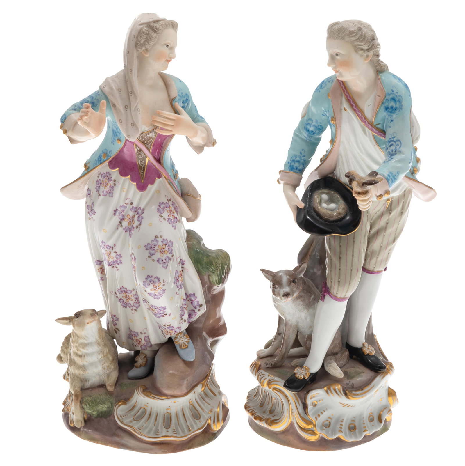 Meissen Porcelain Figures, A Shepherdess and a Man with a dog.: Meissen Porcelain Figures, A Shepherdess and a Man with a dog. Germany Early to Mid 20th century The shepherdess standing by a recumbent sheep wearing simple 18th Century dress painted in colors and g