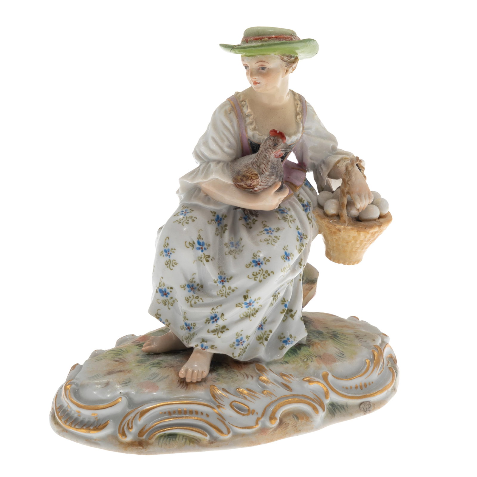 A Meissen Porcelain Figure of a Young Woman.: A Meissen Porcelain Figure of a Young Woman. Probably depicting Marie Antoinette as a peasant in her hamlet. The young woman holding a chicken and basket of eggs, dressed in the 18th century 'Pastoral