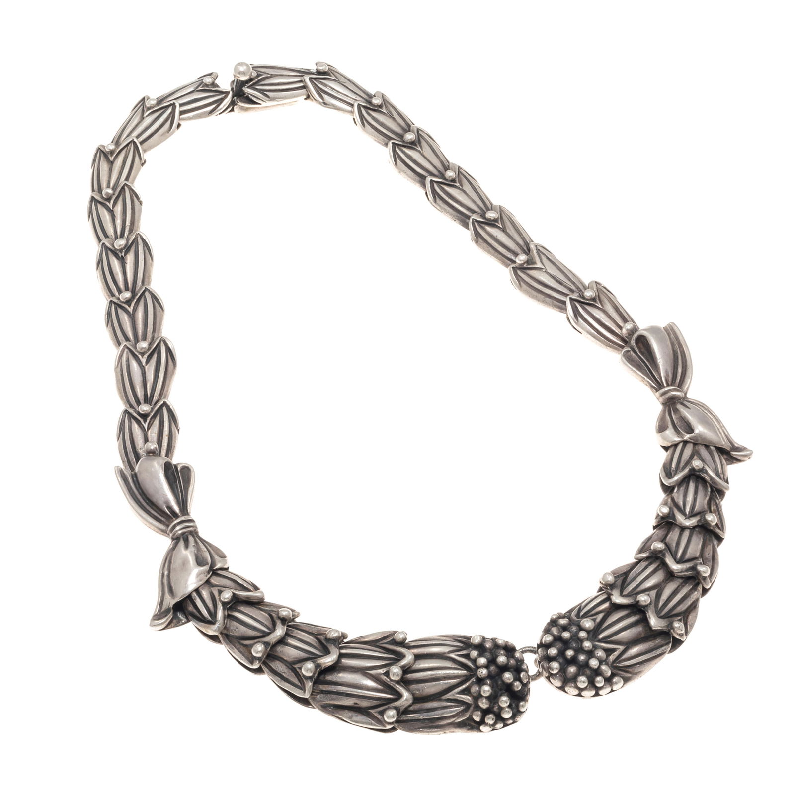 Margot de Taxco Mexican Sterling 'Cornflower' Necklace with Mexican Silver Book: Margot de Taxco Mexican Sterling 'Cornflower' Necklace with Mexican Silver BookThe sterling silver articulated cornflower and bow-motif links completed by a push-button tongue-and-groove clasp forming