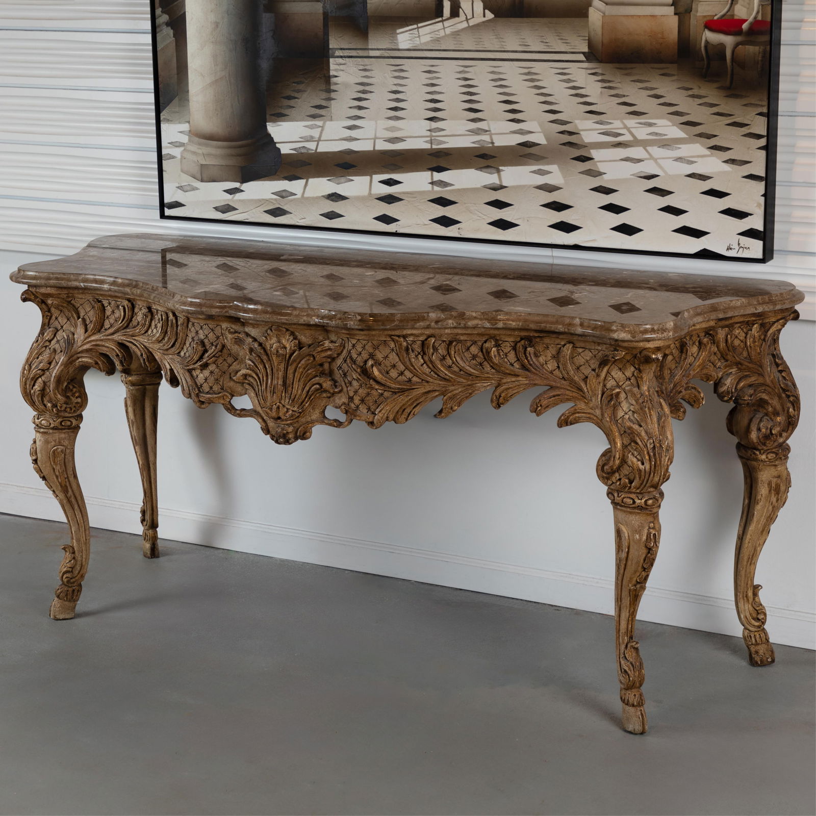 Italian Rococo Console Table: Italian Rococo Console TableThe arbalette breccia marble top above a recessed frieze carved as feathered palms on a lattice ground raised on cabriole legs carved with acanthus sending in coven hoof fe