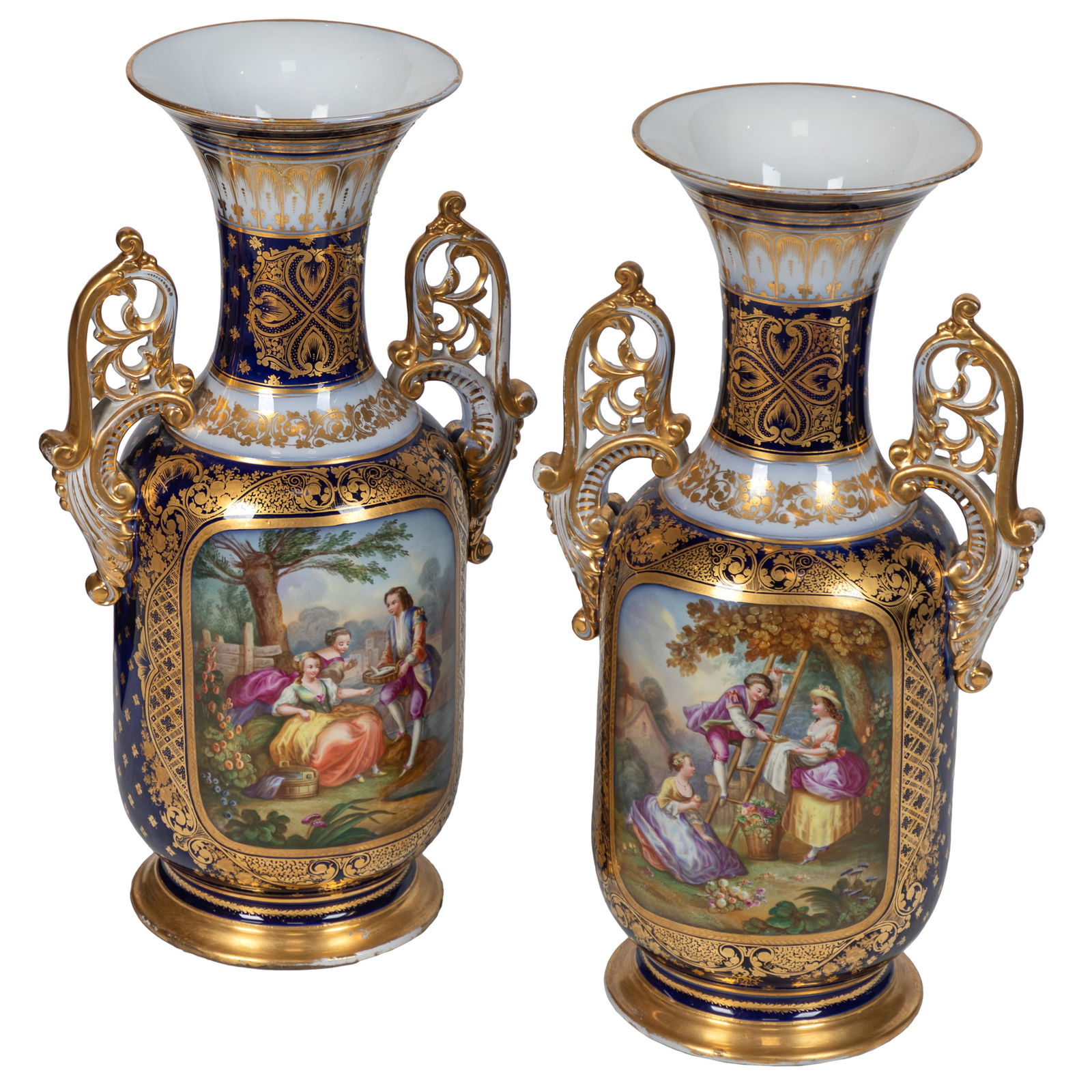 Pair of Sevres Style Porcelain Urns: Pair of Sevres Style Porcelain UrnsEach decorated with gilt flower heads on a cobalt ground with a reserve painted with bucolic scenes of peasants in 18th century dress. one depicting the rescue of a