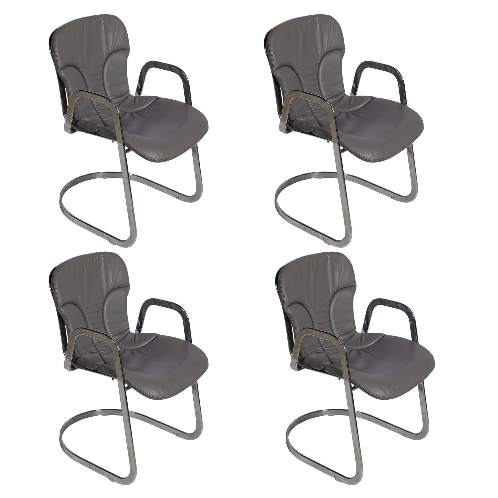 Willy Rizzo for Cidue Armchairs: Willy Rizzo for Cidue ArmchairsA set of four, each with grey leather upholstery on a chrome frame.32in (81cm) h. 22in (56cm) w.bearing label Cidue, ItalyCondition: seats show minor wear consistent wit