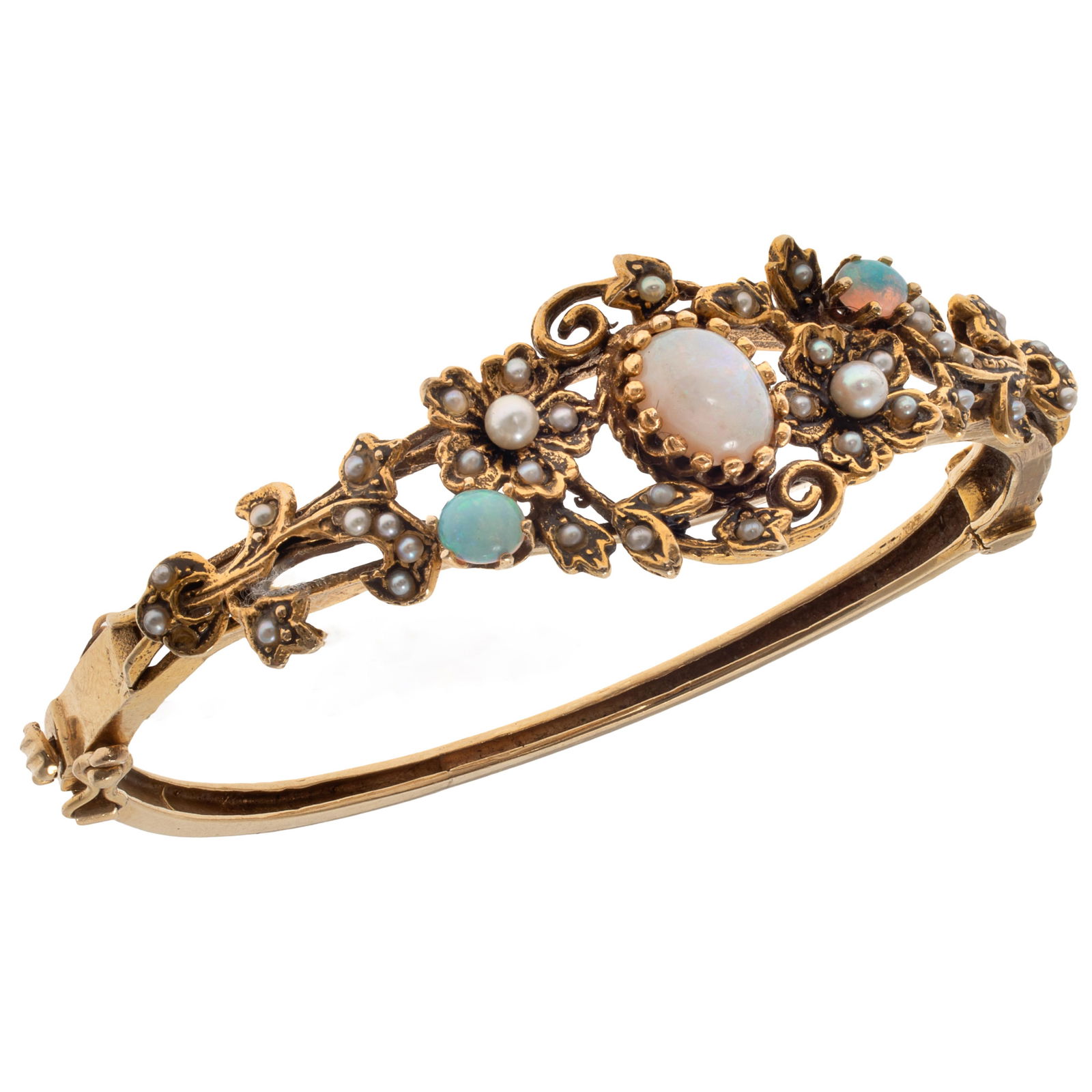 Opal, Split Pearl, 14k Yellow Gold Bracelet: Opal, Split Pearl, 14k Yellow Gold BraceletFeaturing three oval-cut opals measuring from approximately 8.25 x 6.10 mm to 4.5 x 3.0 mm, accented by numerous split pearls, set in a foliate motif, 14k ye