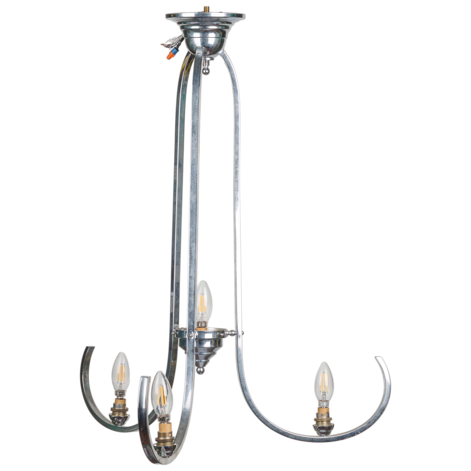 Art Deco Chrome Chandelier: Art Deco Chrome ChandelierOf three elongated down curved arms, each supporting a candle cup, joined by a central candle cup.30in (76cm) h. 30in (76cm) d.