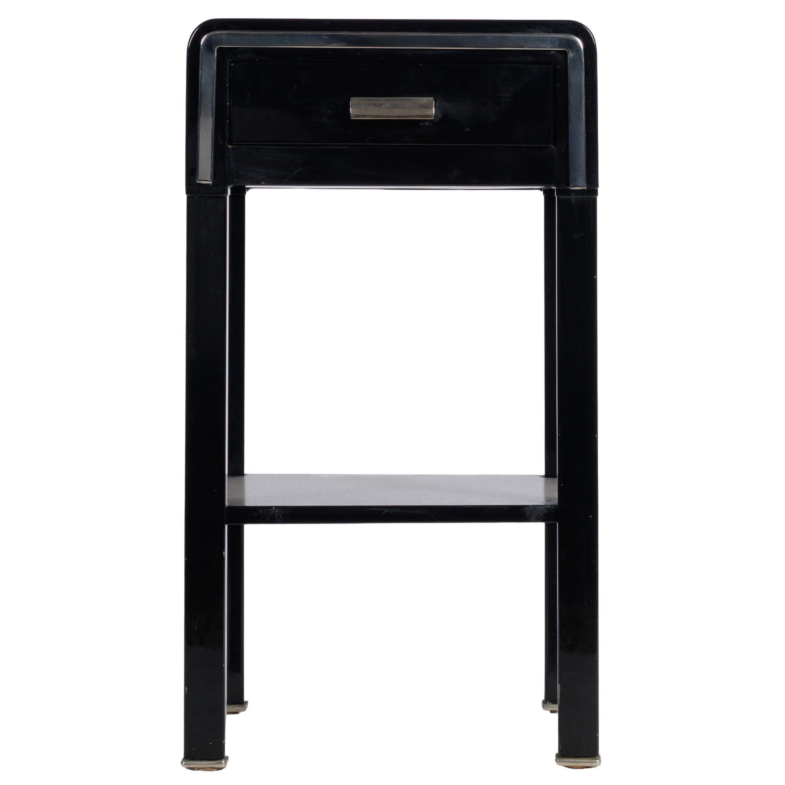 Lacquered Metal and Chrome Nightstand: Lacquered Metal and Chrome NightstandAfter a design by Norman Bel GeddesWith a single drawer and lower shelf highlighted and contrasted with chrome on tapering legs ending in chrome banded feet.26 1/2
