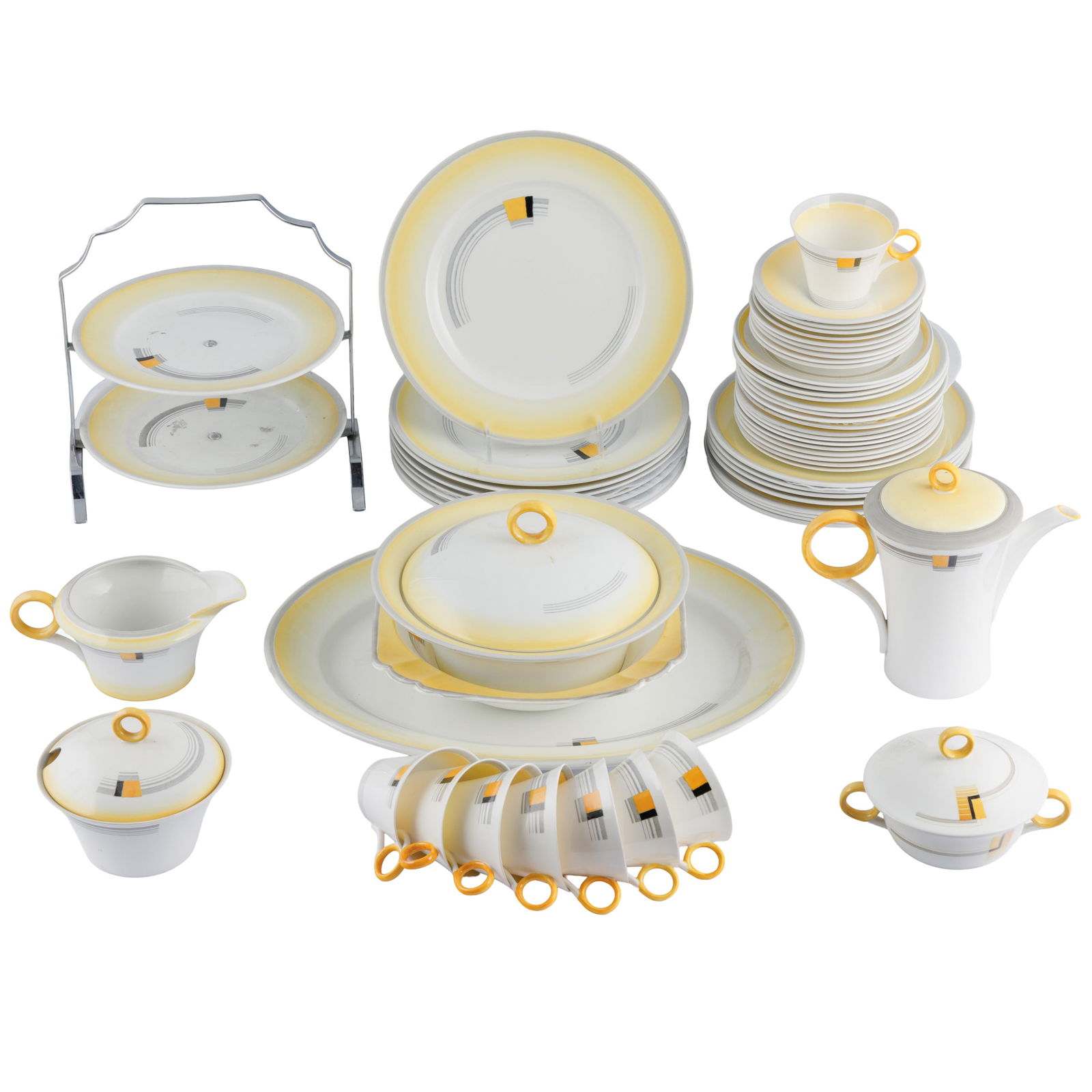 Shelley Art Deco Luncheon Set: Shelley Art Deco Luncheon SetBlocks and Bands patternA large set of Art Deco design bone chine including;One 8in coffee potEight 3in coffee cupsNine 5 1/2in saucersFour 6 1/2in saucersOne 11in tiered