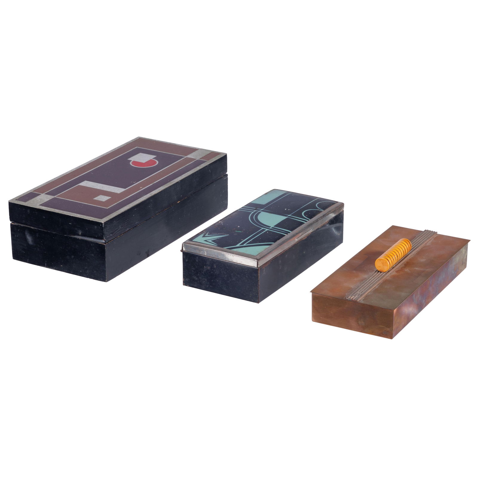 A Group of Decorative Boxes: A Group of Decorative BoxesThree, including a Lacquer and wood Walter Dorwin Teague Kodak box with geometric design, 2 1/2in (7cm) h 4 1/2in (11cm) w. 9in (22cm) l.,A lacquer top wood box with geometr