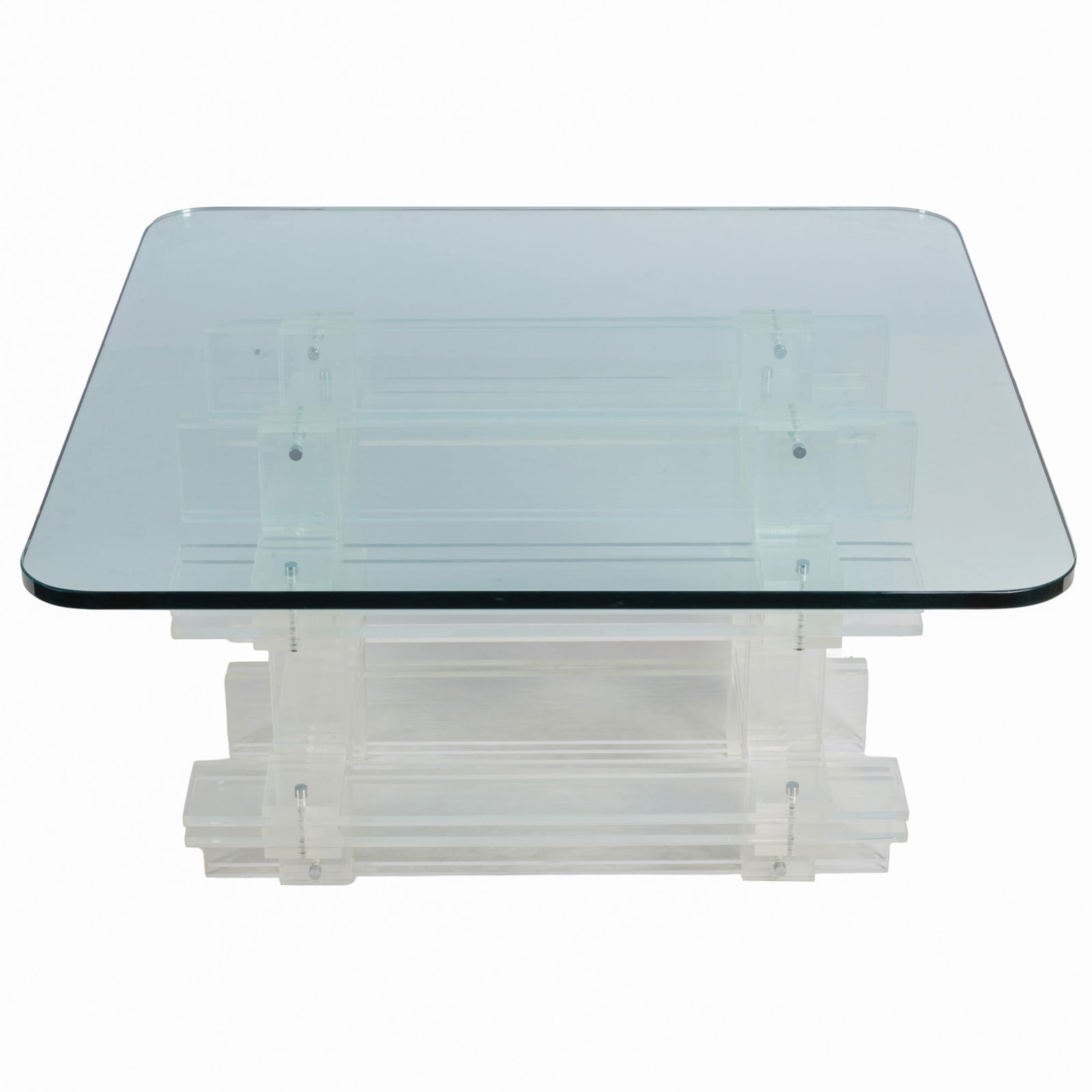 Modernist. Glass and Lucite Cocktail Table: Modernist. Glass and Lucite Cocktail TableThe rectangular glass table supported on cross stacked Lucite panels.21in (54cm) h. 36in (92cm) sq.From the former Premier Art Deco Store 'Decodence' in San F