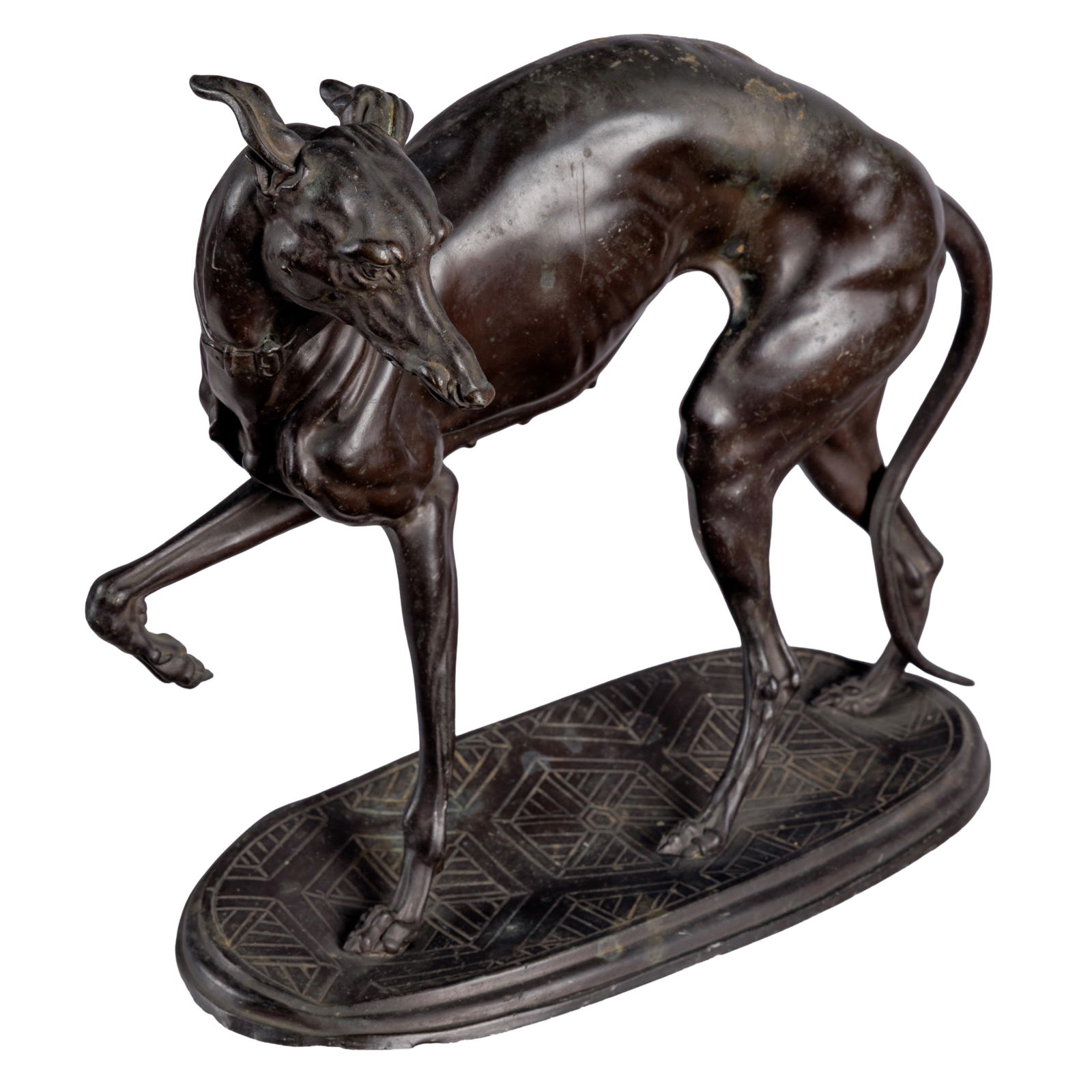 Spelter Figure of a Greyhound, in the style of Antoine-Louis Barye: Spelter Figure of a Greyhound, in the style of Antoine-Louis BaryeThe figure with one leg raised and a twisting arched posture, .standing on an oval base.9 1/2 in (24cm) h. 10.1/2in (27cm) l.Condition