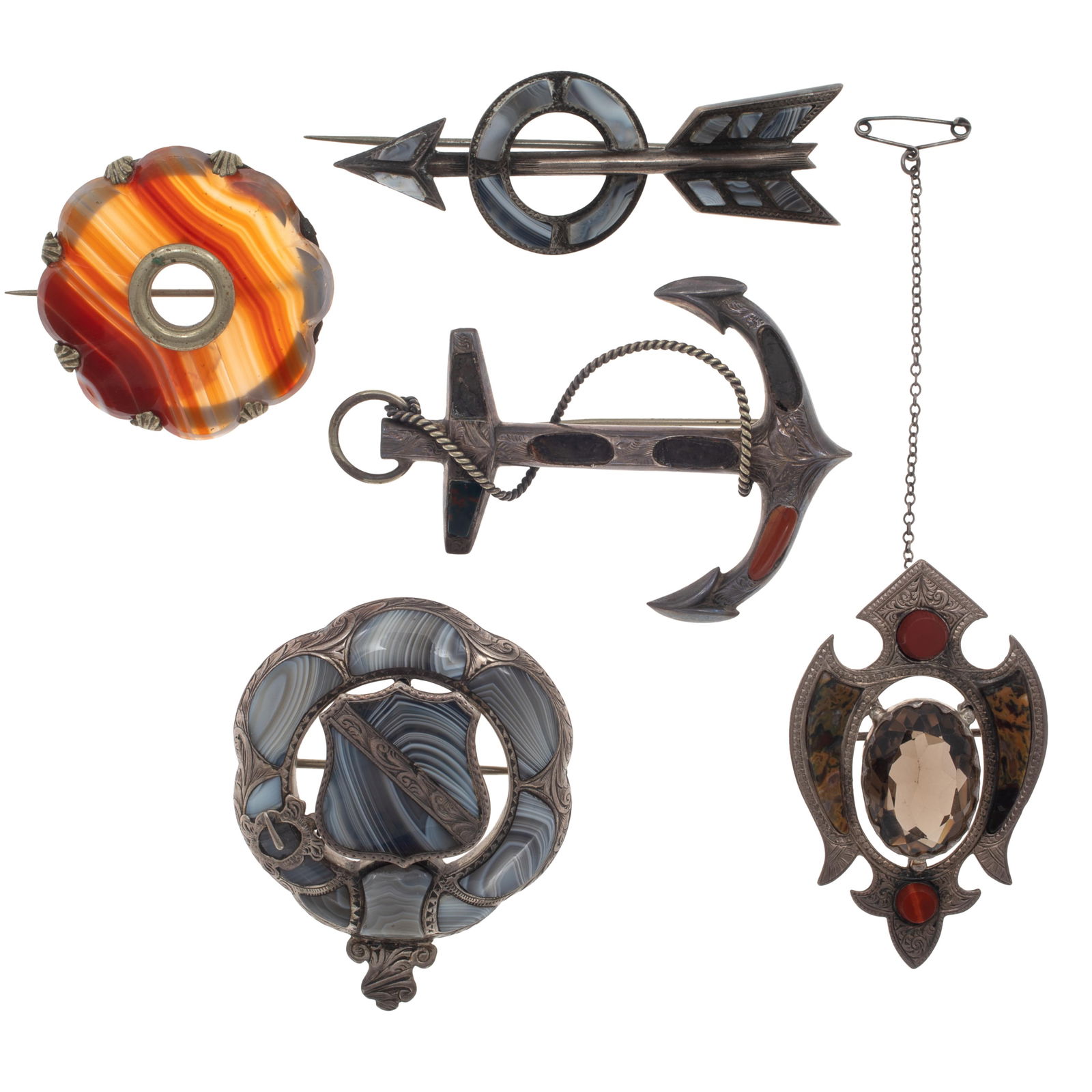 Collection of Five Victorian Scottish Agate Silver Pins: Collection of Five Victorian Scottish Agate Silver PinsIncluding one shield-shaped pin centering an oval smoky quartz framed by jasper, set in a silver mounting measuring approximately 2.20 x 1.35 inc