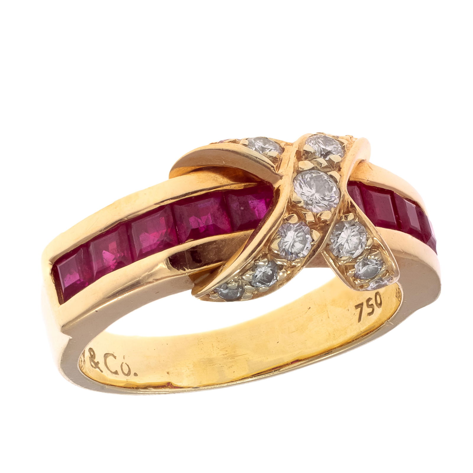 Tiffany & Co. Ruby, Diamond, 18k Yellow Gold Ring: Tiffany & Co. Ruby, Diamond, 18k Yellow Gold Ring Centering an 'X' accented by twelve round brilliant-cut diamonds weighing a total of approximately 0.45 cttw., further accented by ten square,