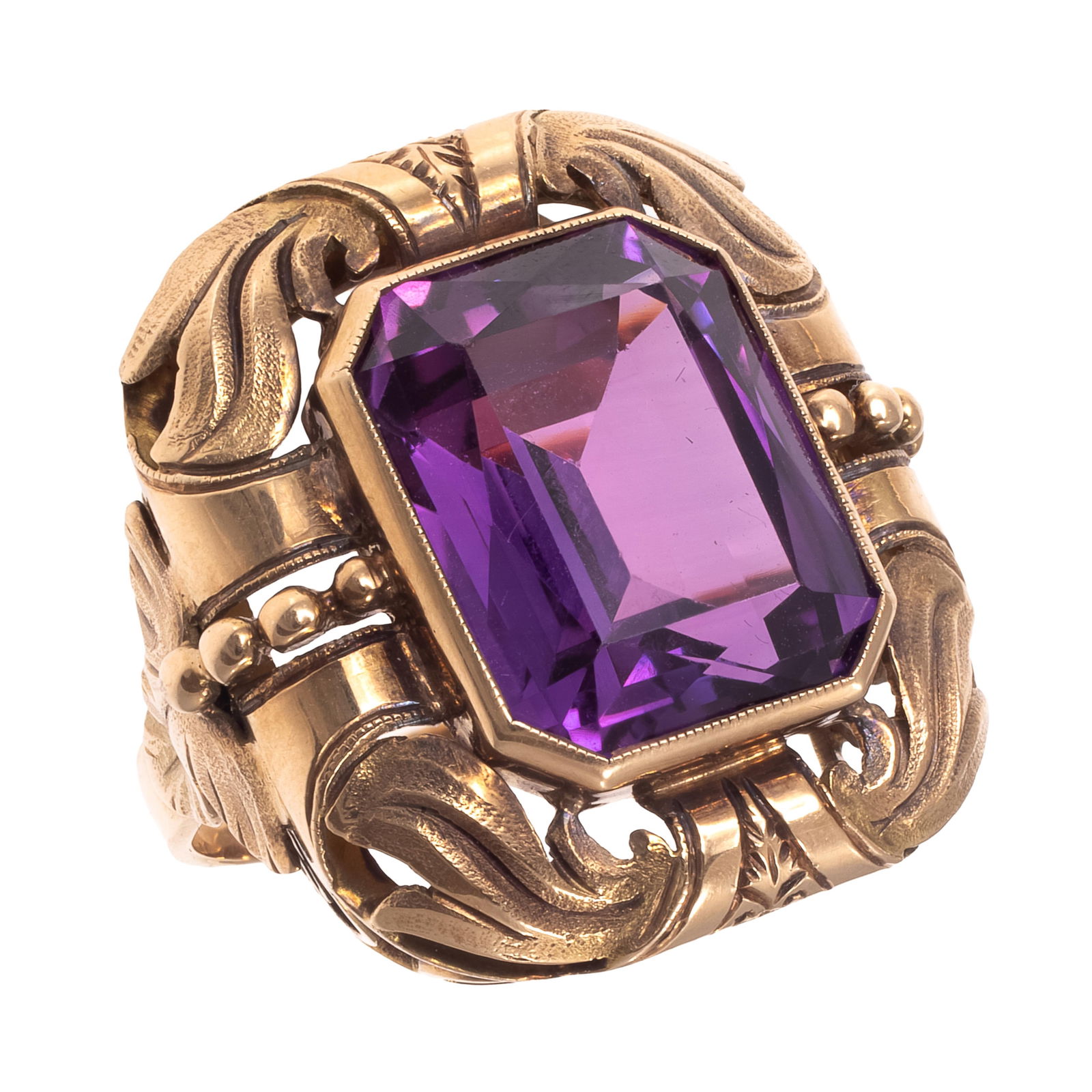 Synthetic Sapphire, 14k Yellow Gold Ring: Synthetic Sapphire, 14k Yellow Gold RingFeaturing a rectangular synthetic alexandrite-like sapphire measuring approximately 14.20 x 11.60 mm, set in a foliate motif, 14k yellow gold ring mounting, siz