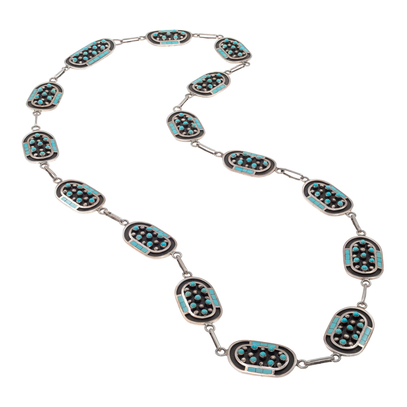 Zuni Turquoise, Sterling Silver Belt, Jobeth Maize: Zuni Turquoise, Sterling Silver Belt, Jobeth MaizeFeaturing inlaid turquoise and round turquoise cabochons set in overlaid sterling silver stations, each measuring approximately 2.05 x 1.00 inches, fo
