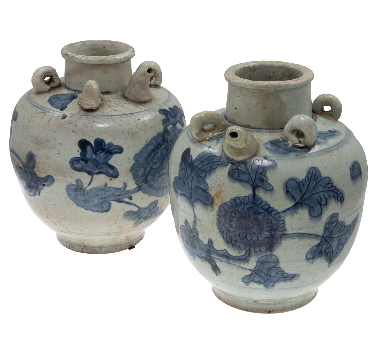 A Pair of Ming Dynasty Wine Jars: A Pair of Ming Dynasty Wine Jars Each cobalt decorated with chrysanthemum and scrolling floral vines. 13in (34cm) h.