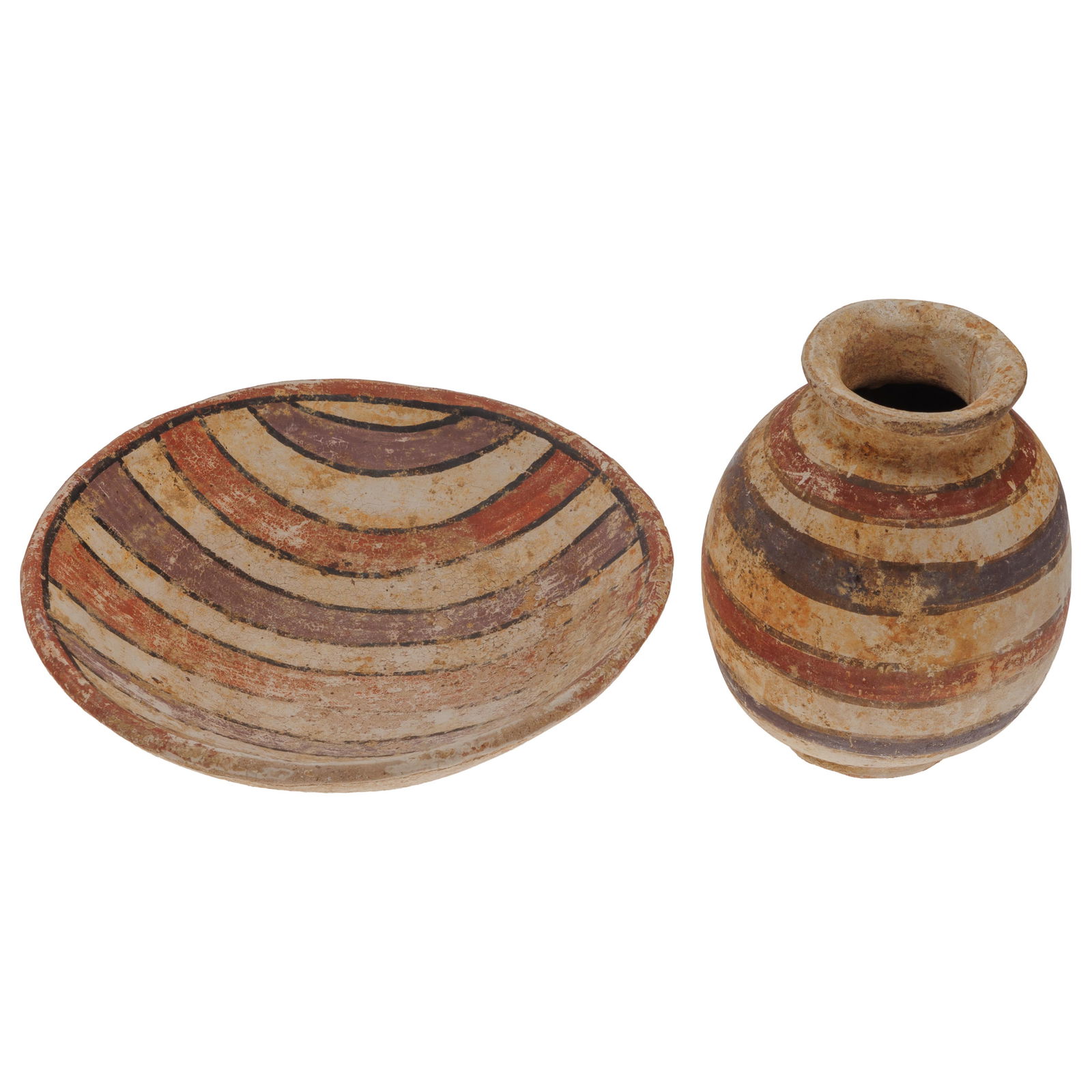 Pre Columbian Pottery: Pre Columbian PotteryPossibly Central AmericanMineral painted fired clay bowl and jug.Bowl 2 3/4in (7cm) h. 9in (23cm) dJug 6 3/4in (17cm) h. 5in (12cm) d.Condition: Surface abrasion, chips to edges.