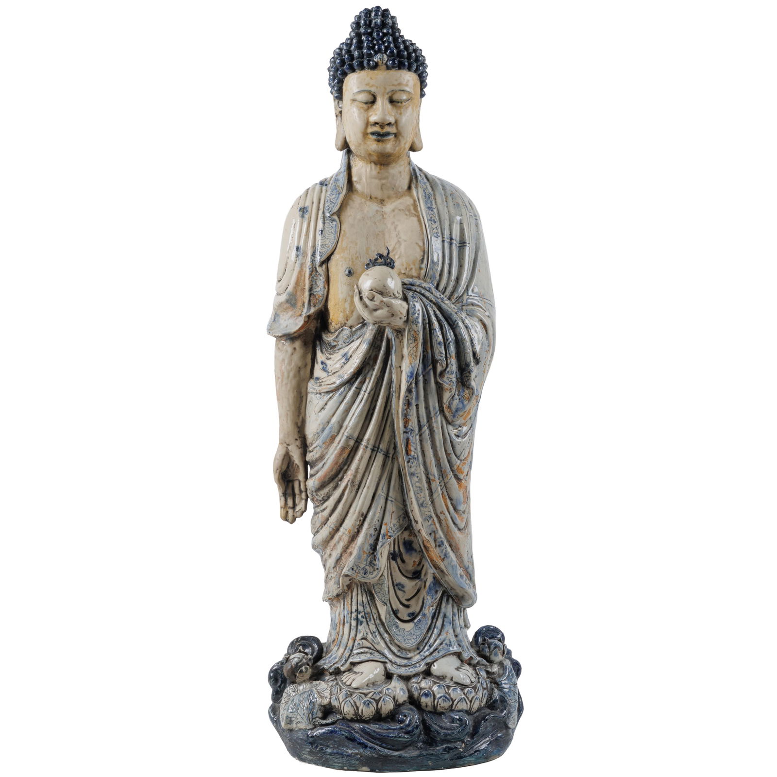Chinese or Tibetan Statue of Buddha: Chinese or Tibetan Statue of Buddha Of gazed ceramic, the figure with tight snail curls, with a loose robe about the shoulders, holding an apple. 45in (114cm) Condition: Loss to leaves and apple stem