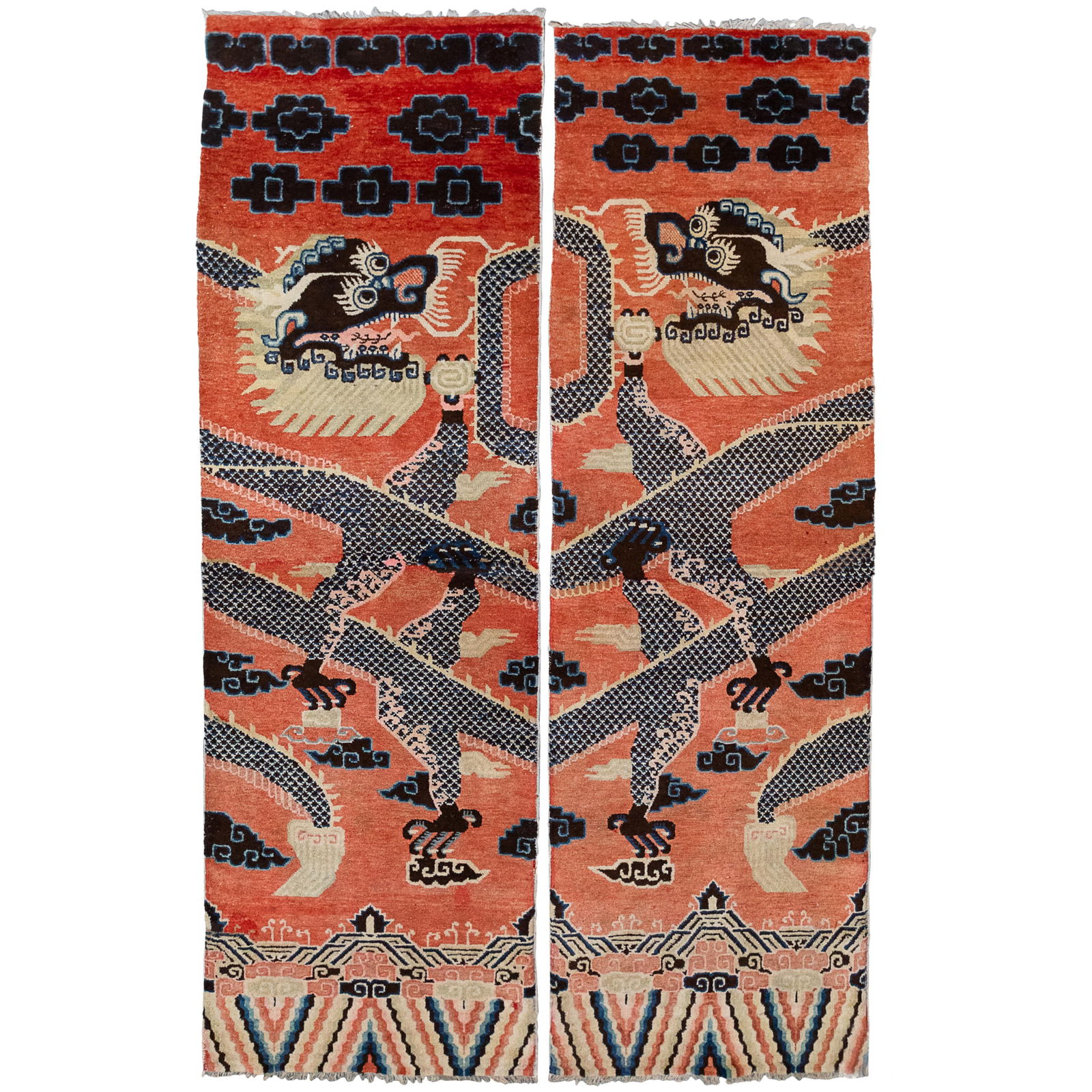 Pair of Ningxia Pillar Rugs: Pair of Ningxia Pillar Rugs Each depicting a five clawed dragon under a cloud band. 34in (87cm) w. 110in (9ft.2in) (2.79m) l.